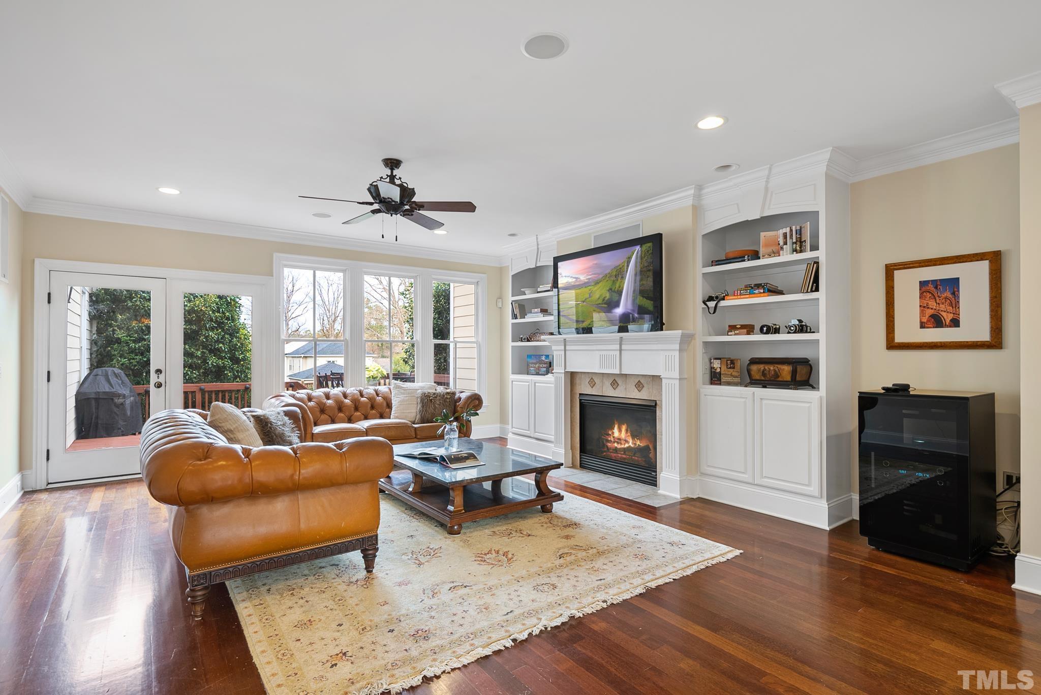 3044 Farrior Road Raleigh, NC 27607 - Photo 10 of 64 a living room with furniture fireplace and window