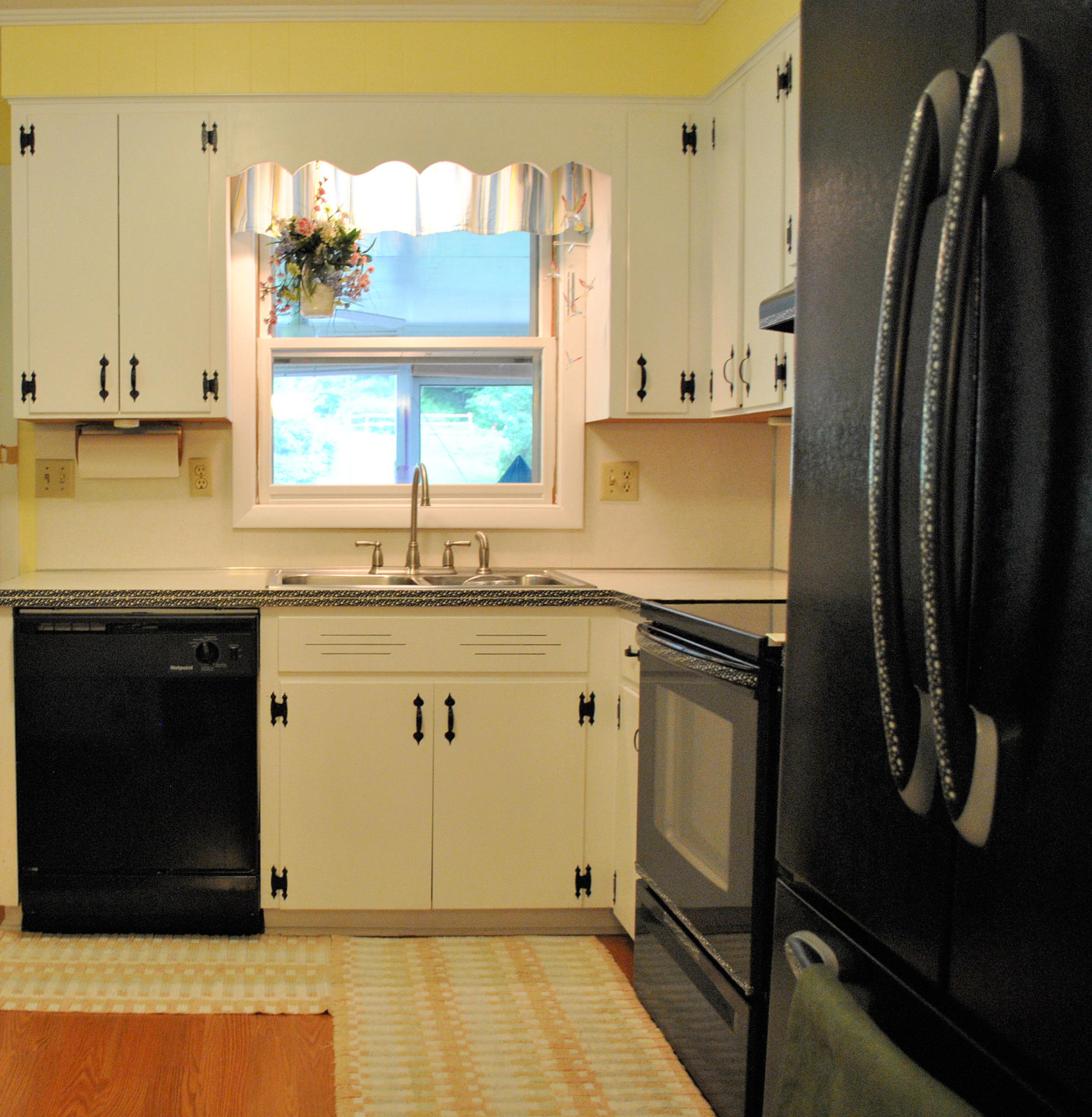 219 Berryhill Road Northwest Riner, VA 24149 - Photo 11 of 54 a kitchen with stainless steel appliances granite countertop a refrigerator and a stove