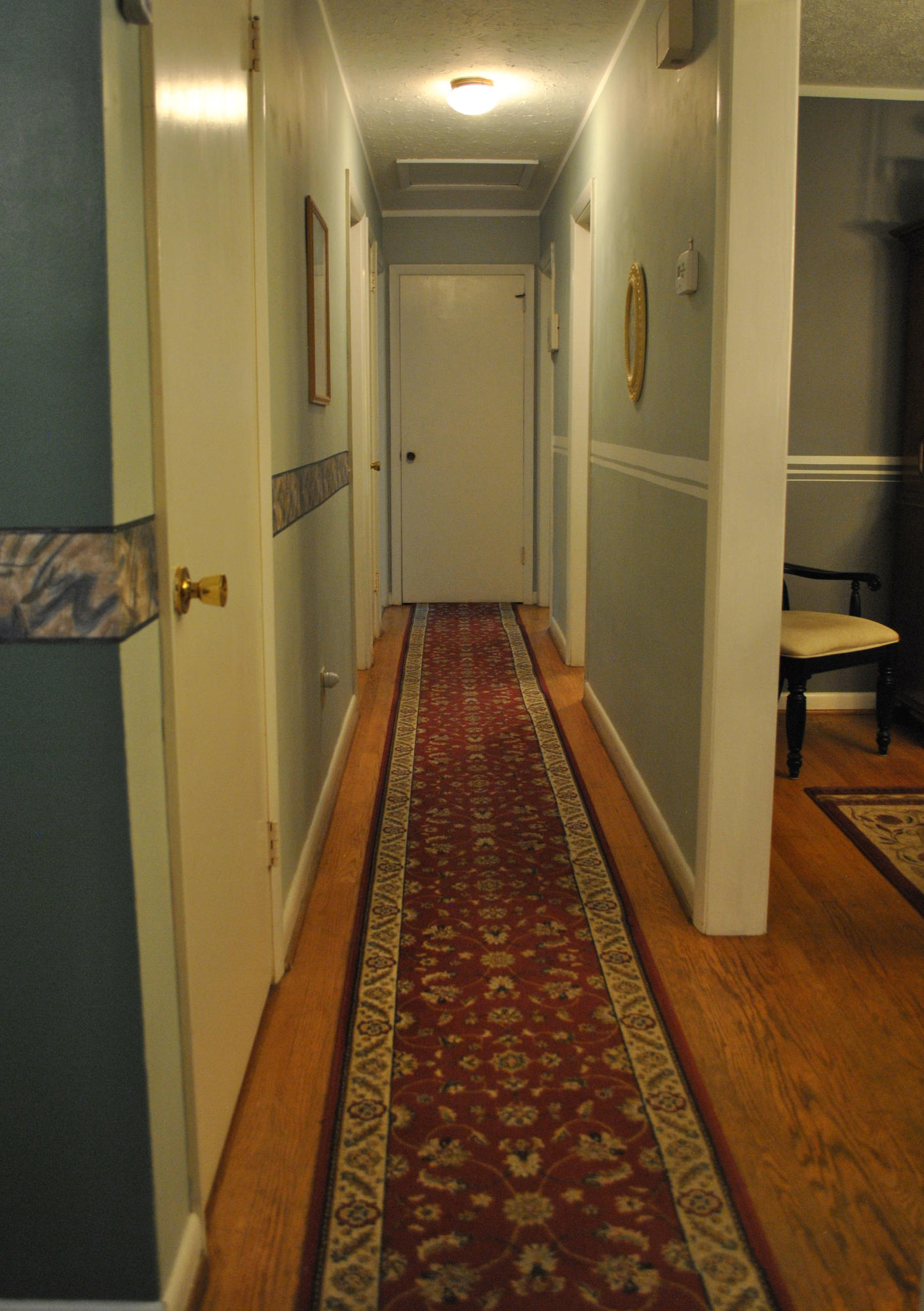219 Berryhill Road Northwest Riner, VA 24149 - Photo 14 of 54 a view of hallway with wooden floor