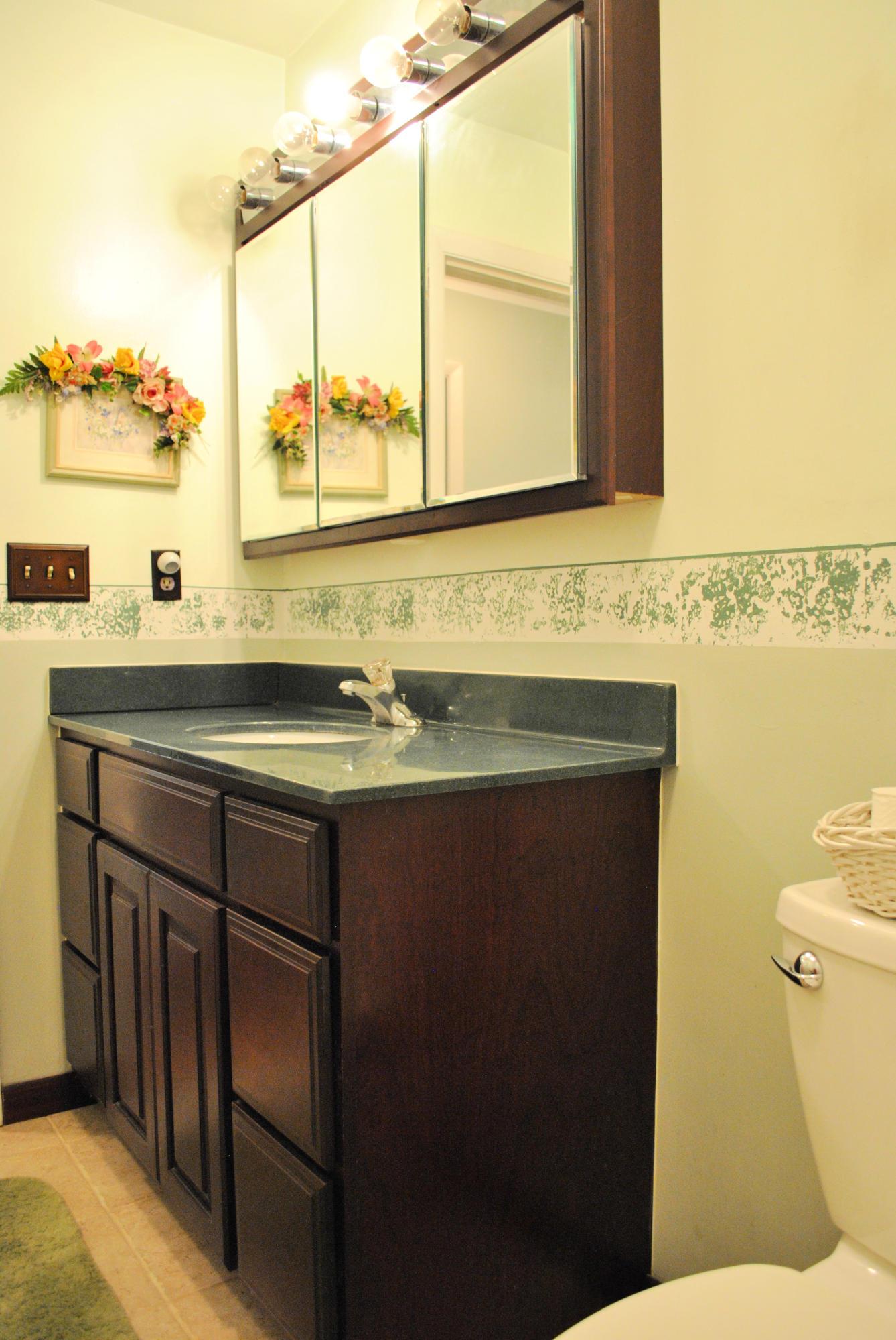 219 Berryhill Road Northwest Riner, VA 24149 - Photo 16 of 54 a bathroom with a sink and a toilet