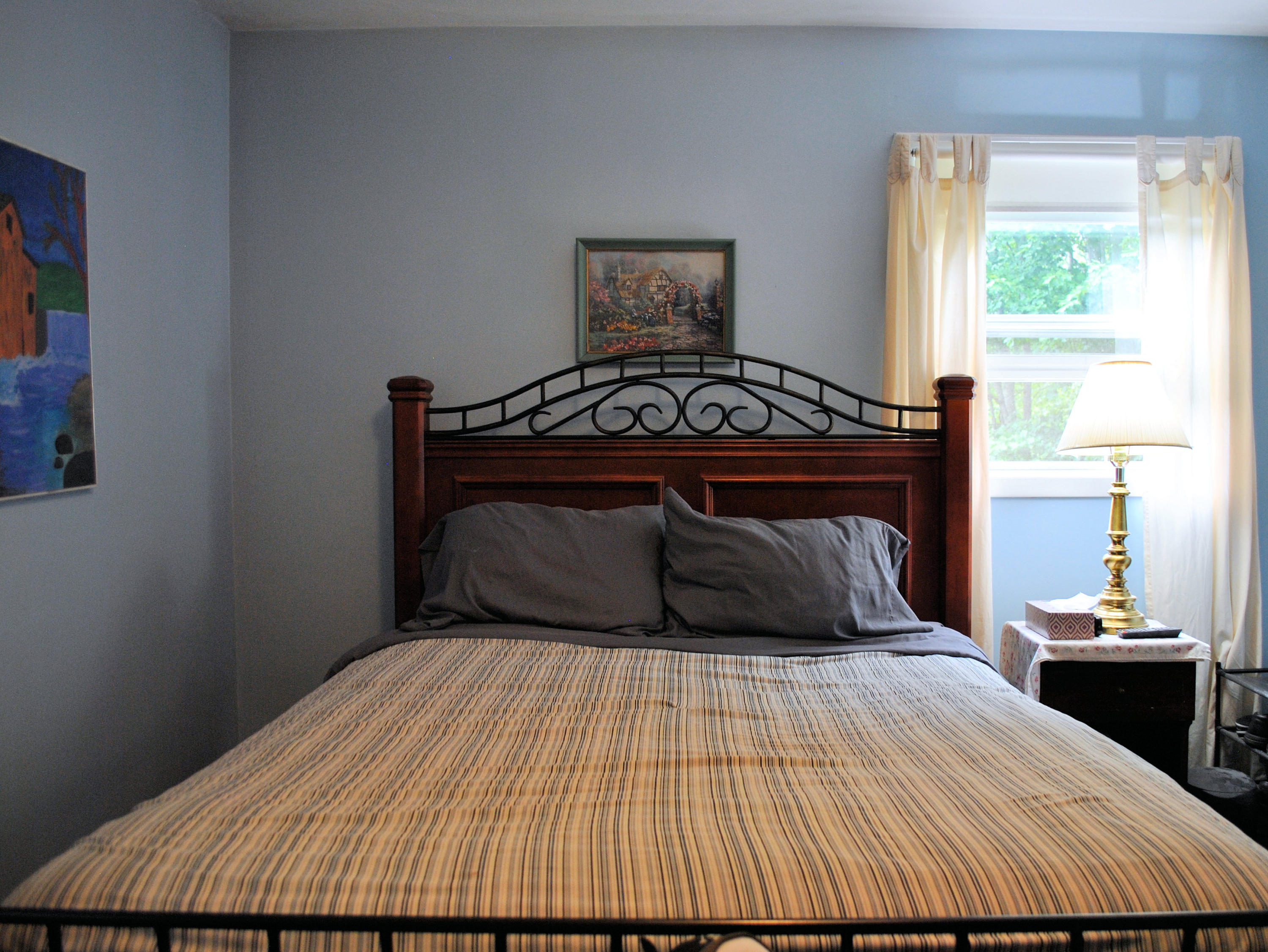 219 Berryhill Road Northwest Riner, VA 24149 - Photo 20 of 54 a bedroom with a bed and window