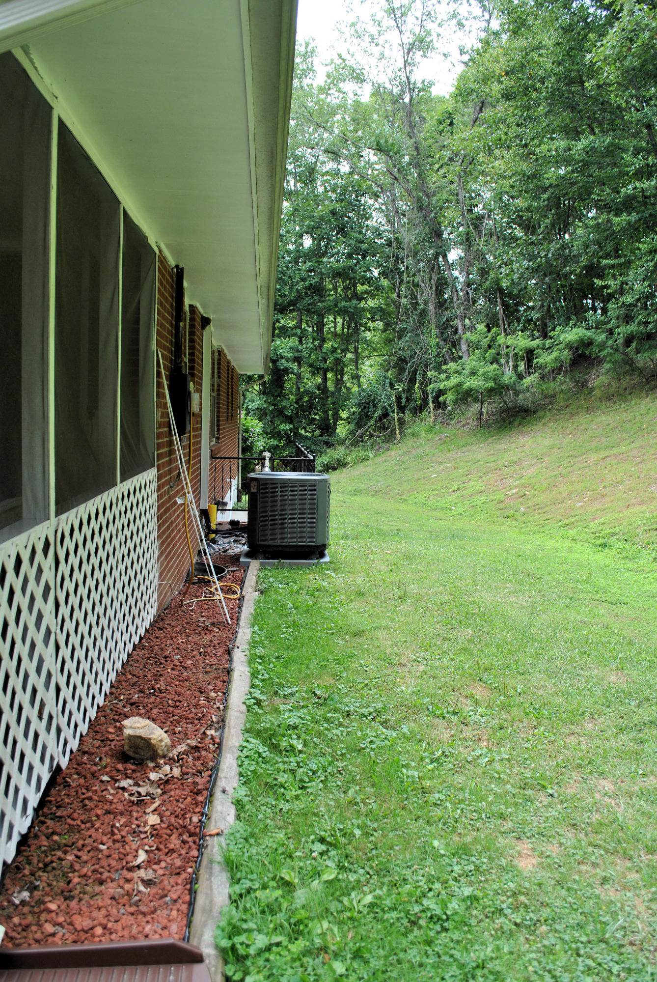 219 Berryhill Road Northwest Riner, VA 24149 - Photo 3 of 54 a backyard of a house with lots of green space