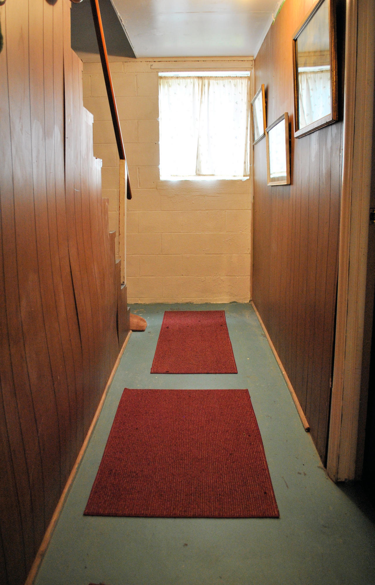 219 Berryhill Road Northwest Riner, VA 24149 - Photo 28 of 54 a view of an empty room with wooden floor and a window