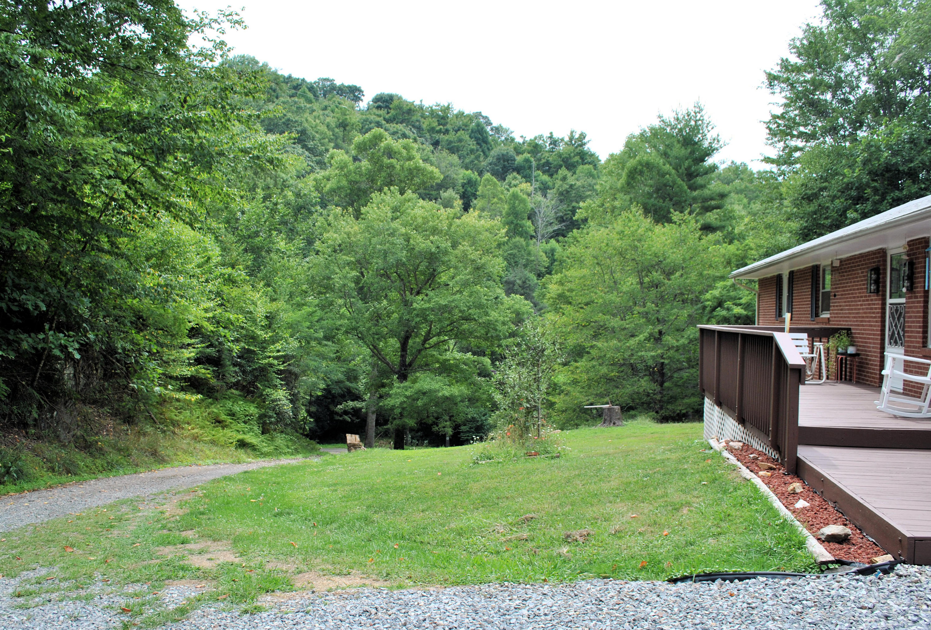 219 Berryhill Road Northwest Riner, VA 24149 - Photo 4 of 54 a view of a porch with a yard