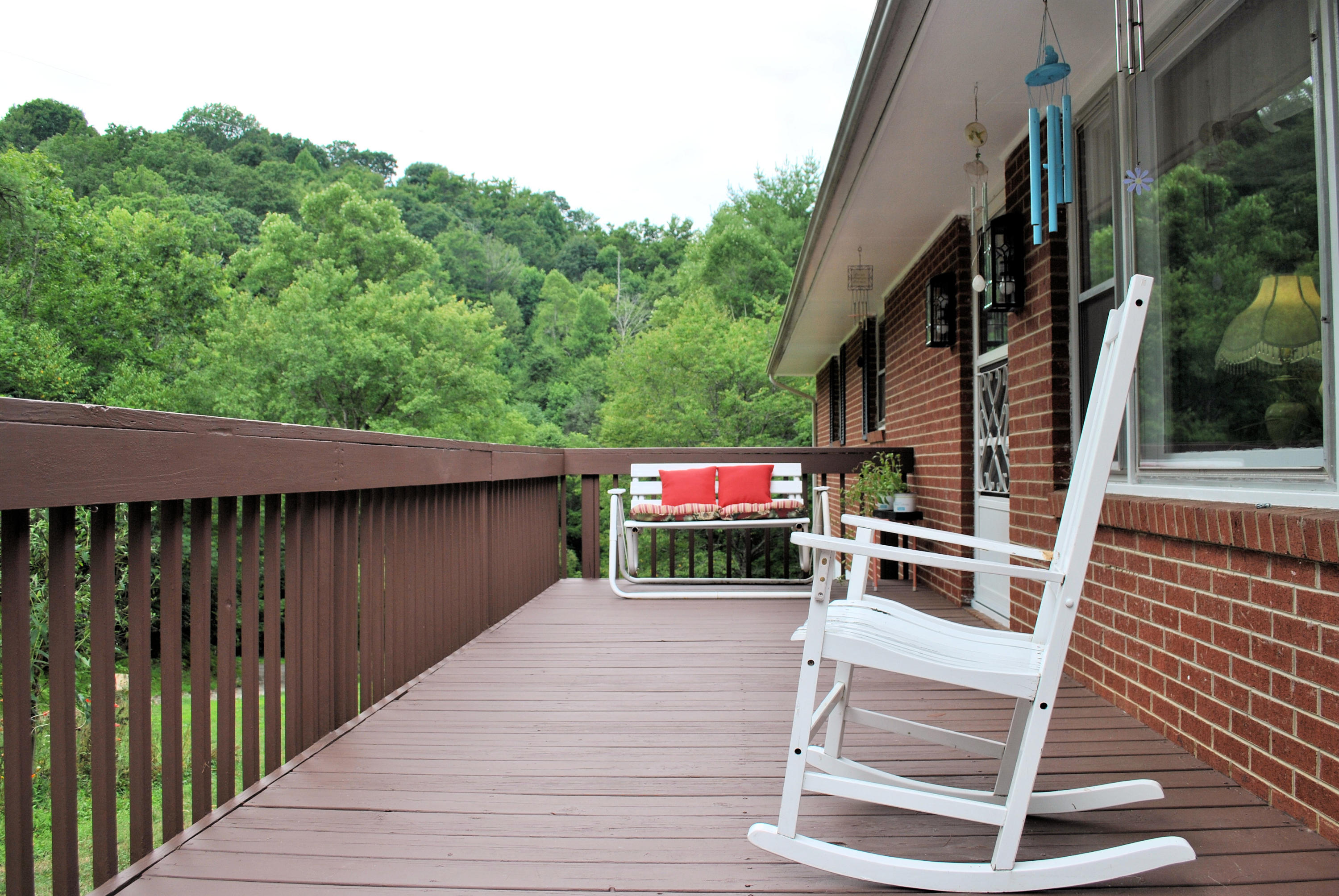 219 Berryhill Road Northwest Riner, VA 24149 - Photo 5 of 54 a balcony view with a backyard space