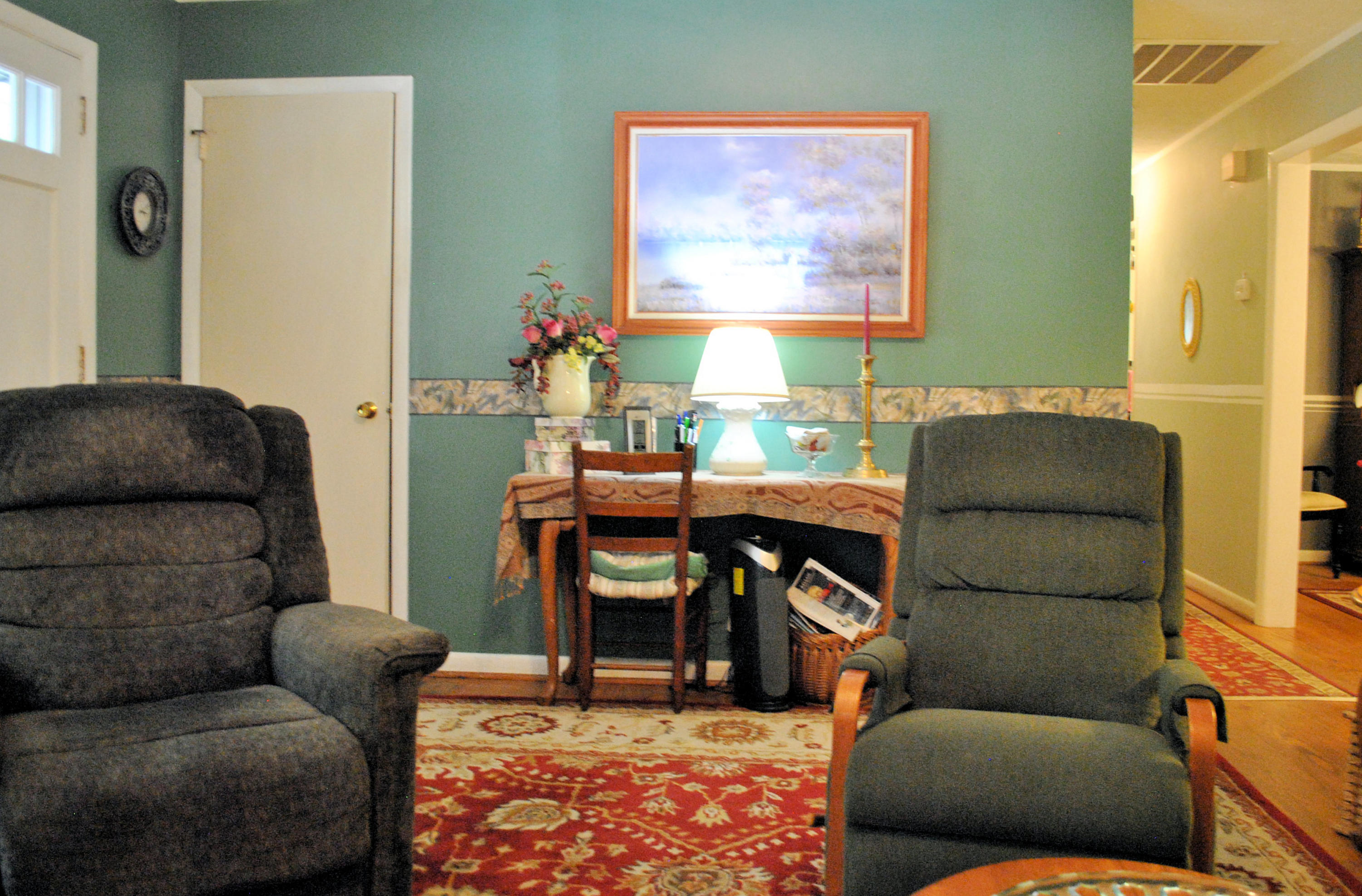 219 Berryhill Road Northwest Riner, VA 24149 - Photo 8 of 54 a living room with furniture and a couch