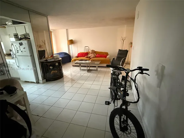 a bed room with furniture and a window