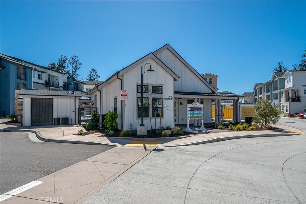 905 Madonna Road, Unit 69 San Luis Obispo, CA 93405 - Photo 21 of 26 a front view of a house with a yard