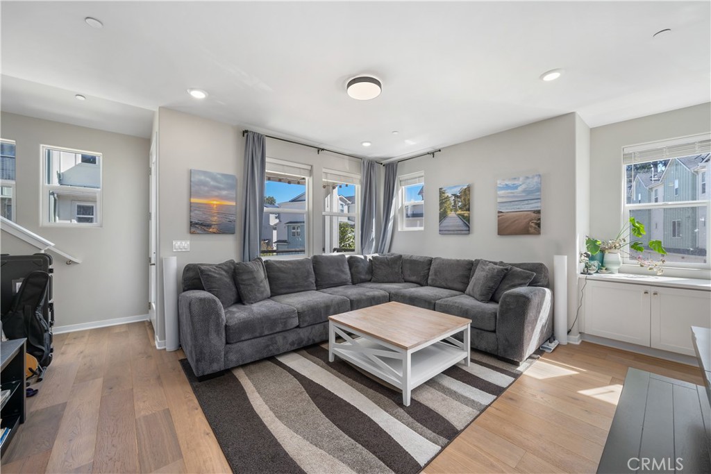 905 Madonna Road, Unit 69 San Luis Obispo, CA 93405 - Photo 7 of 26 a living room with furniture and a flat screen tv
