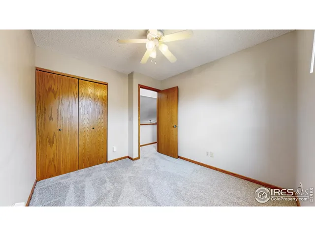 a open hall with a hardwood floor