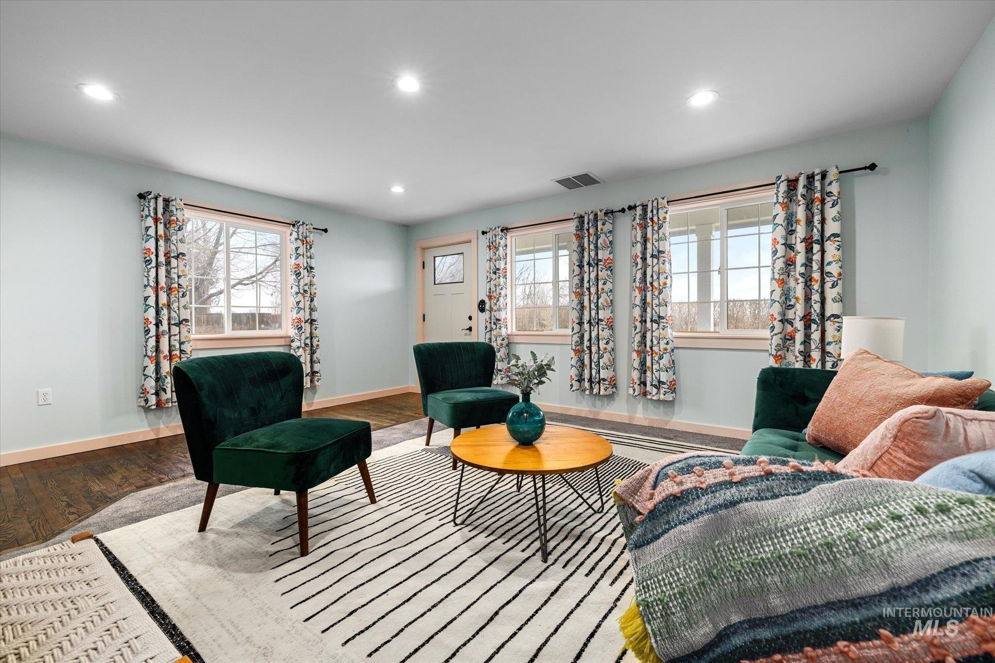 29410 Pearl Road Parma, ID 83660 - Photo 14 of 50 Living area with recessed lighting, wood-type flooring, and plenty of natural light