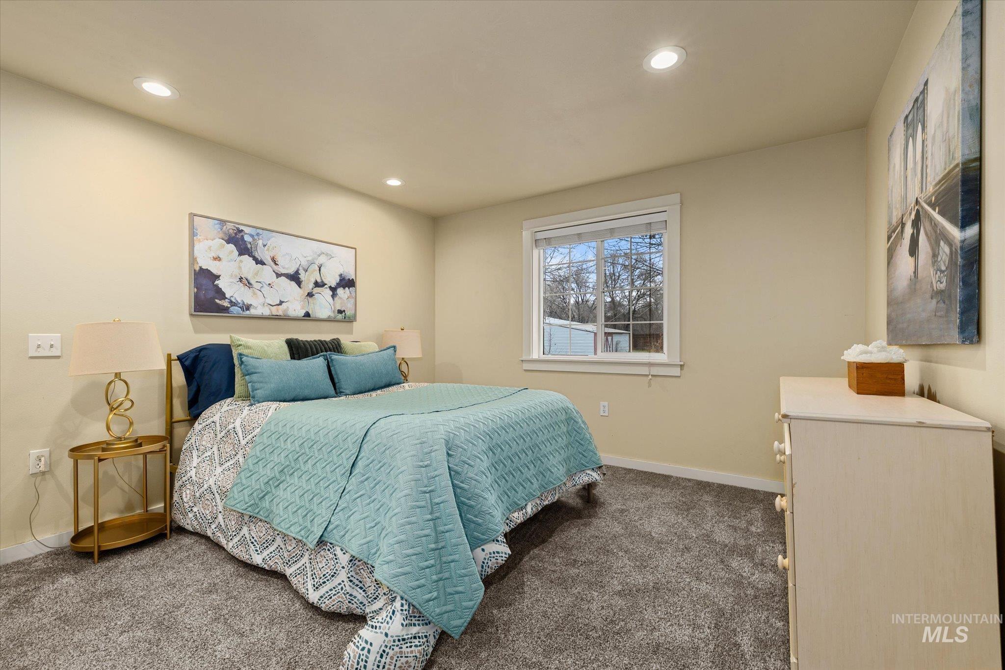 29410 Pearl Road Parma, ID 83660 - Photo 24 of 50 Bedroom featuring dark colored carpet and recessed lighting