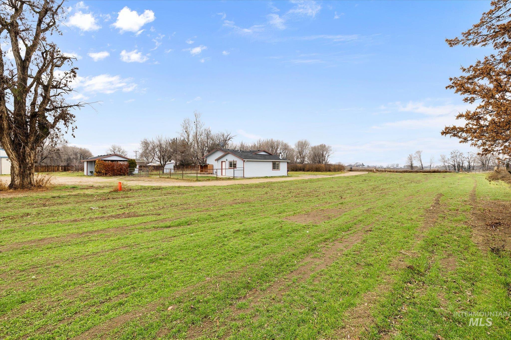 29410 Pearl Road Parma, ID 83660 - Photo 3 of 50 View of yard with a view of countryside