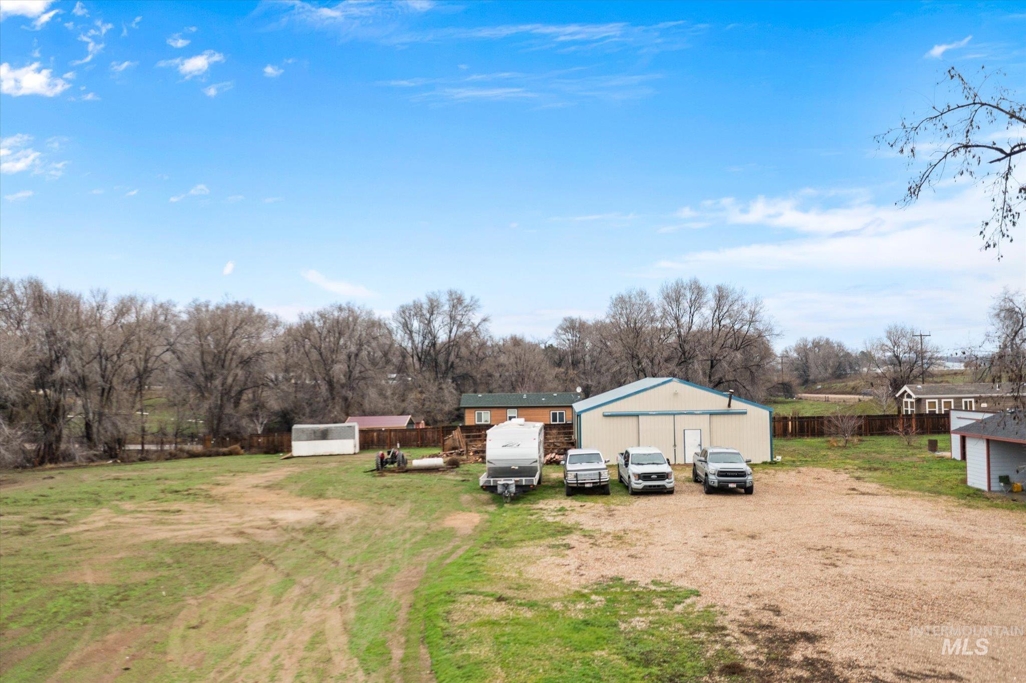 29410 Pearl Road Parma, ID 83660 - Photo 40 of 50 View of yard with an outbuilding and view of wooded area