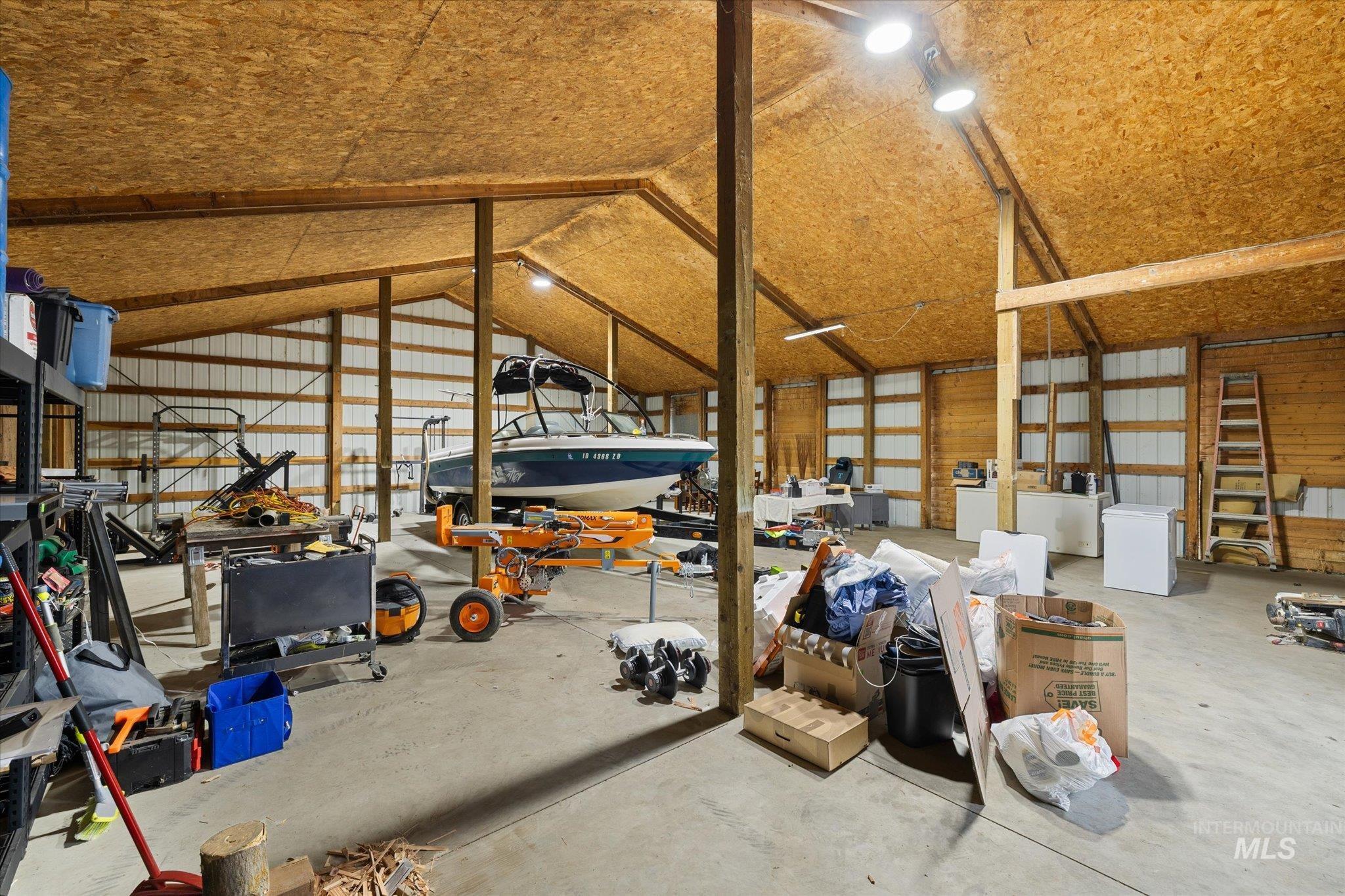 29410 Pearl Road Parma, ID 83660 - Photo 41 of 50 Miscellaneous room with lofted ceiling, concrete flooring, and metal wall