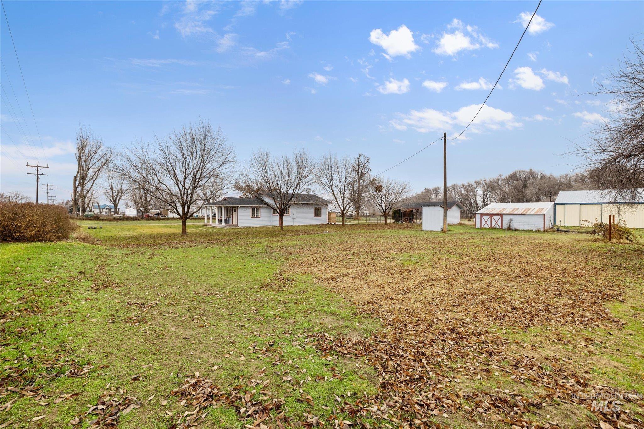 29410 Pearl Road Parma, ID 83660 - Photo 43 of 50 View of green lawn featuring an outbuilding