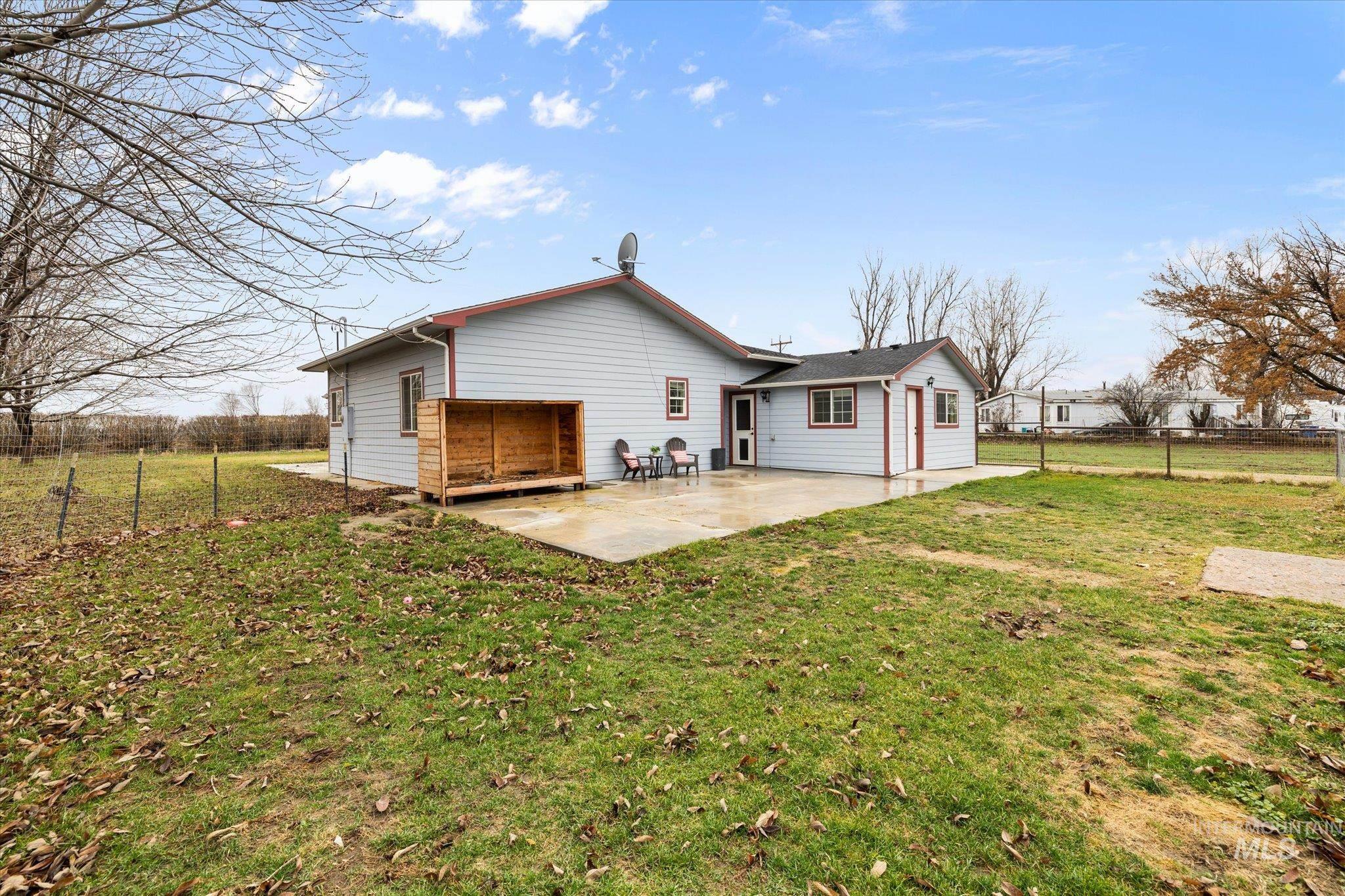 29410 Pearl Road Parma, ID 83660 - Photo 49 of 50 Rear view of property featuring a patio