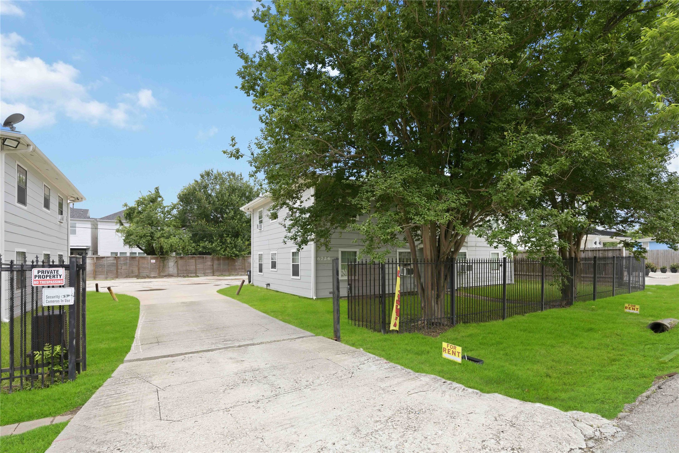 6726 Burkett Street Houston, TX 77021 - Photo 2 of 18 a view of a park with large trees