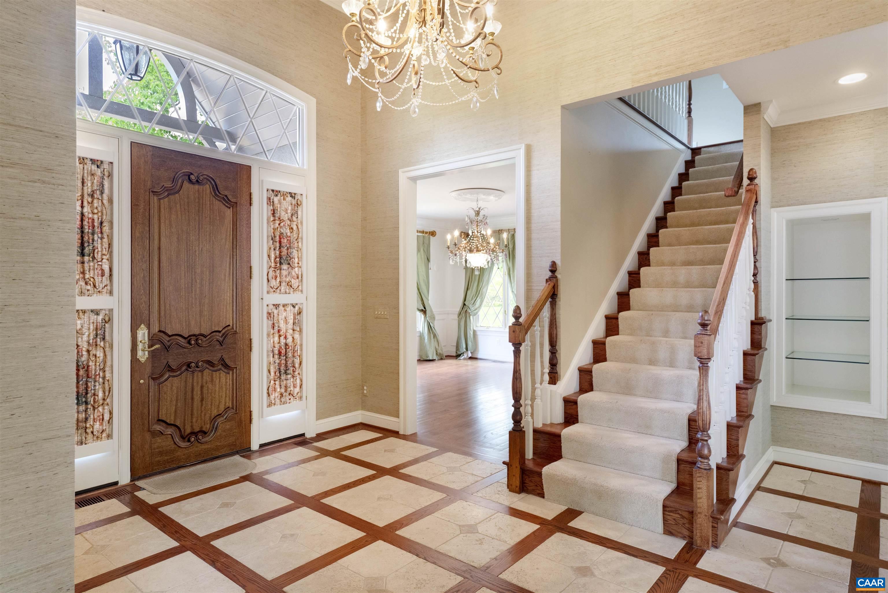 2121 Garth Road Charlottesville, VA 22901 - Photo 17 of 75 a view of entryway with wooden floor and stairs
