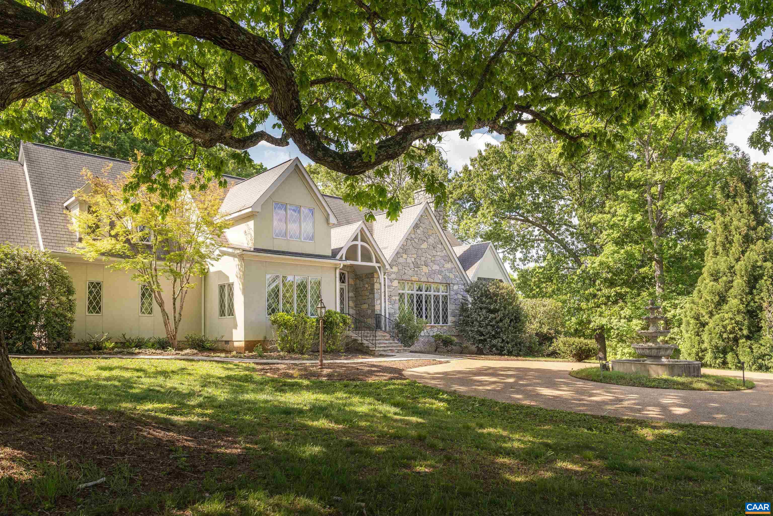 2121 Garth Road Charlottesville, VA 22901 - Photo 4 of 75 a front view of house with yard and green space
