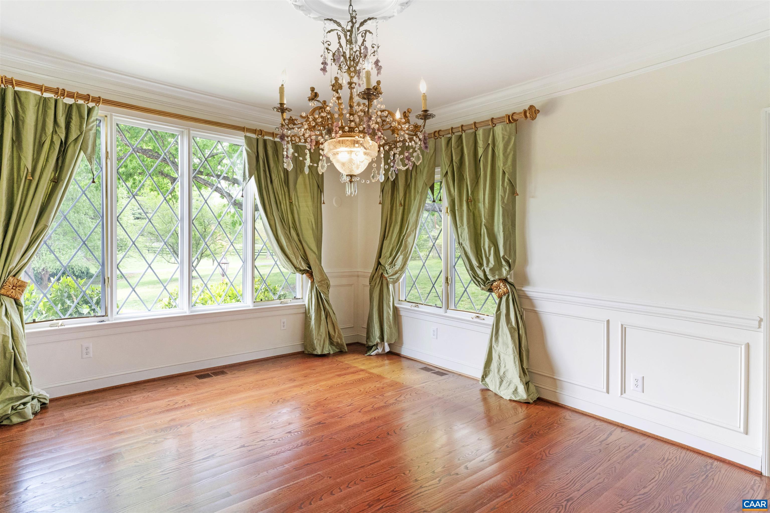 2121 Garth Road Charlottesville, VA 22901 - Photo 50 of 75 a view of empty room with wooden floor and fan