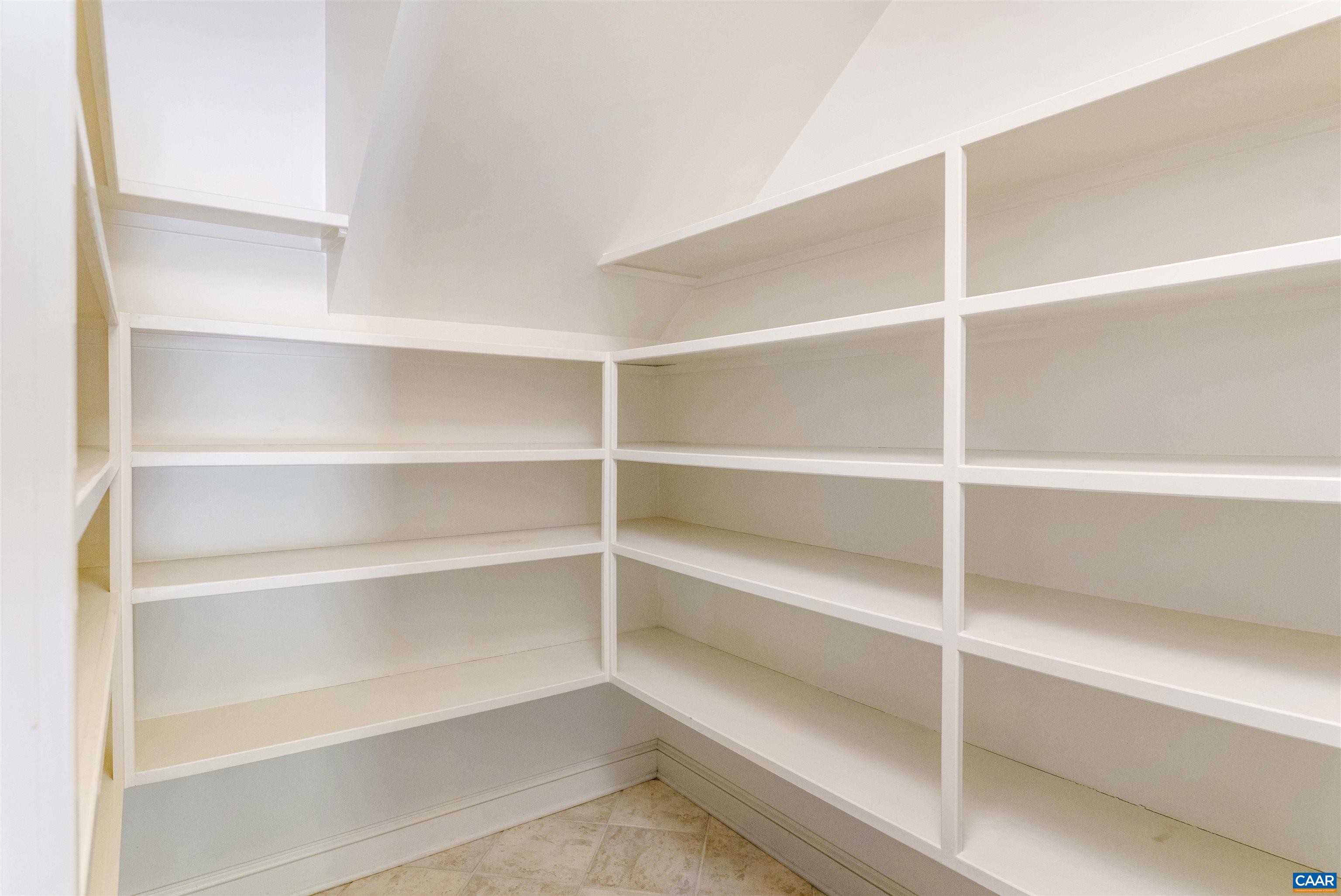 2121 Garth Road Charlottesville, VA 22901 - Photo 54 of 75 a view of walk in closet with empty racks