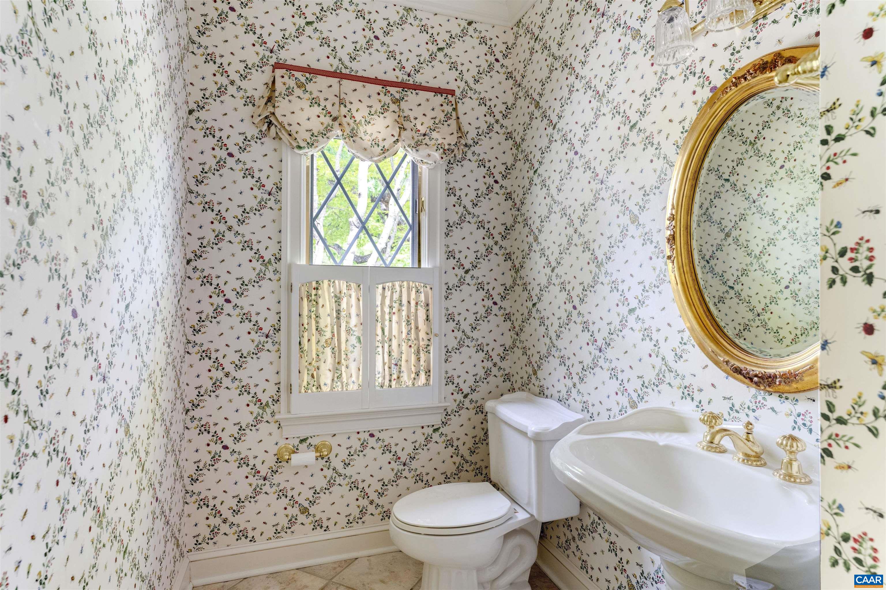 2121 Garth Road Charlottesville, VA 22901 - Photo 63 of 75 a bathroom with a sink and a mirror