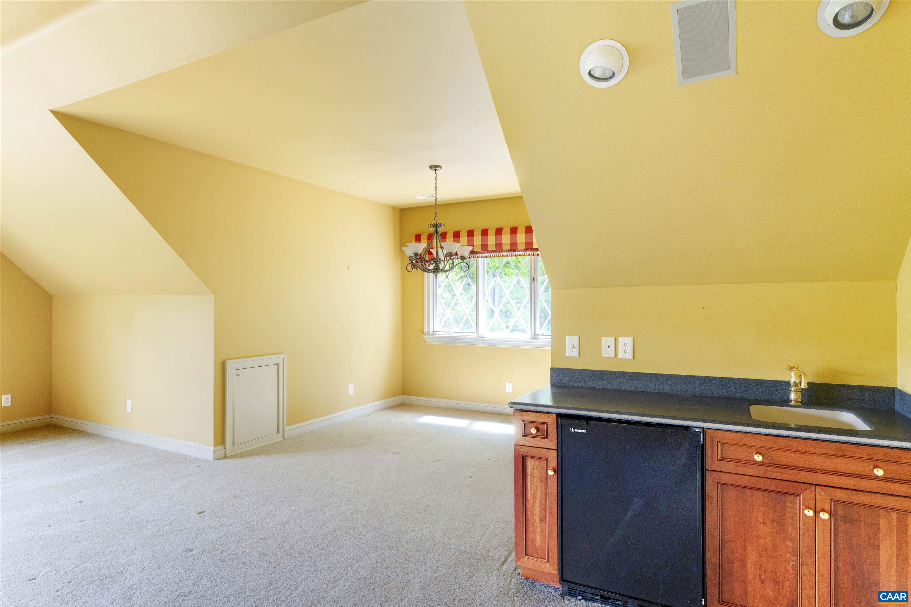 2121 Garth Road Charlottesville, VA 22901 - Photo 66 of 75 a view of a kitchen with a sink and a window