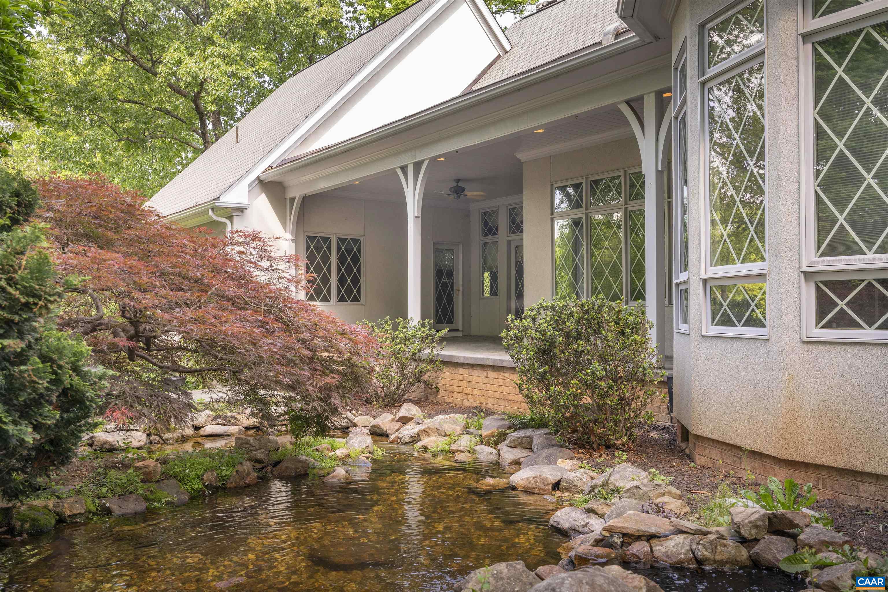 2121 Garth Road Charlottesville, VA 22901 - Photo 9 of 75 a view of a house with a yard