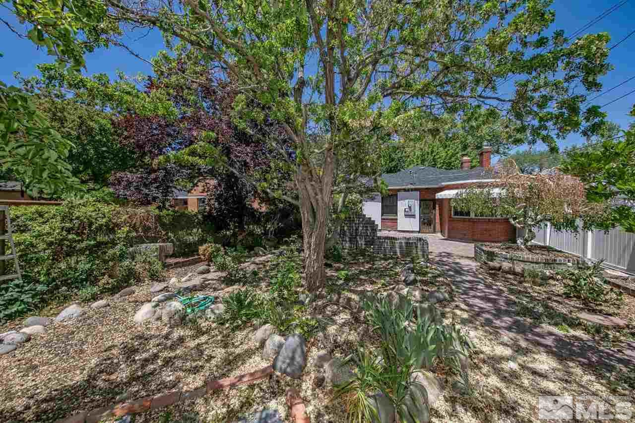 622 Manor Drive Reno, NV 89509 - Photo 24 of 25 a view of a house with a yard