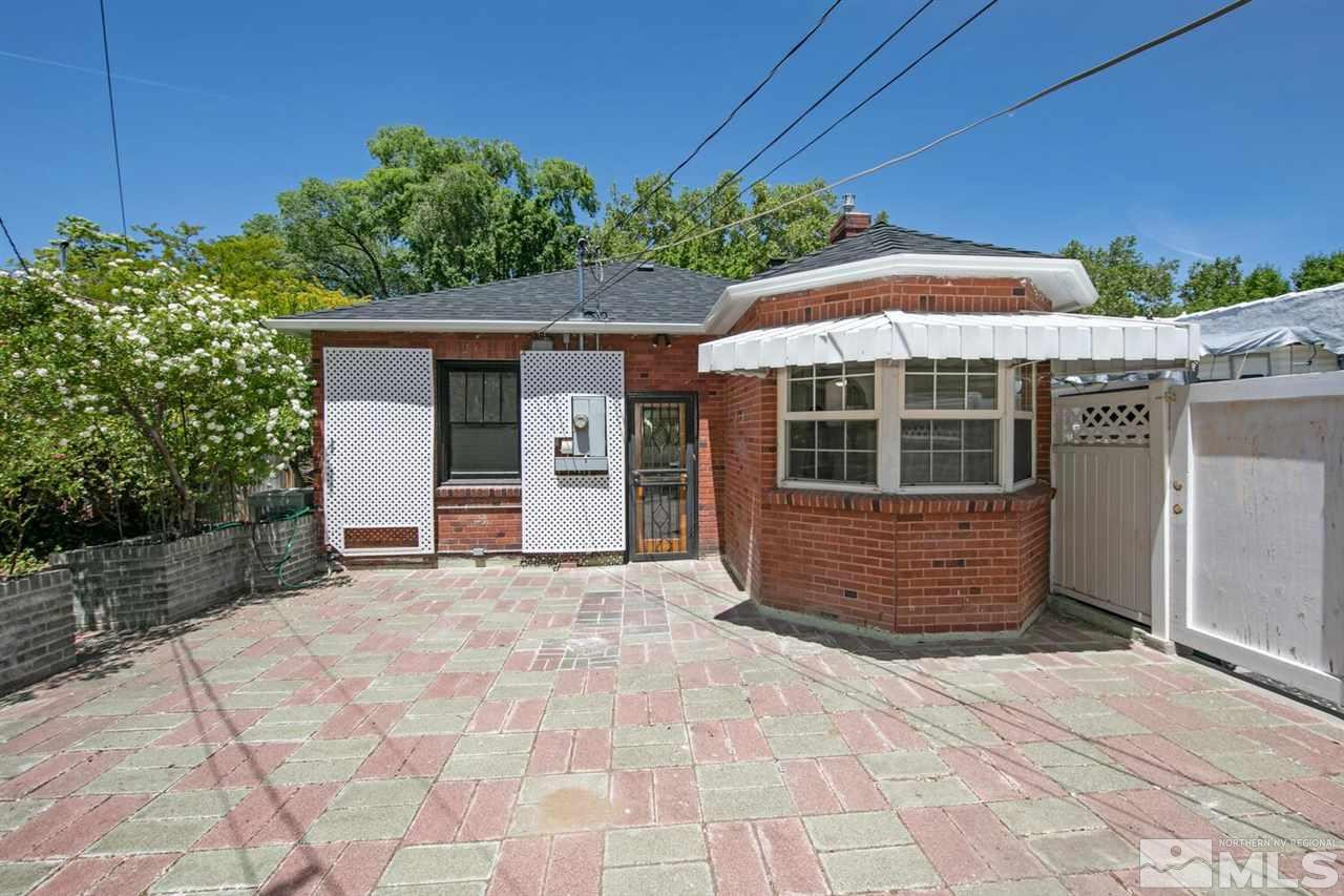 622 Manor Drive Reno, NV 89509 - Photo 25 of 25 a front view of a house with a garden