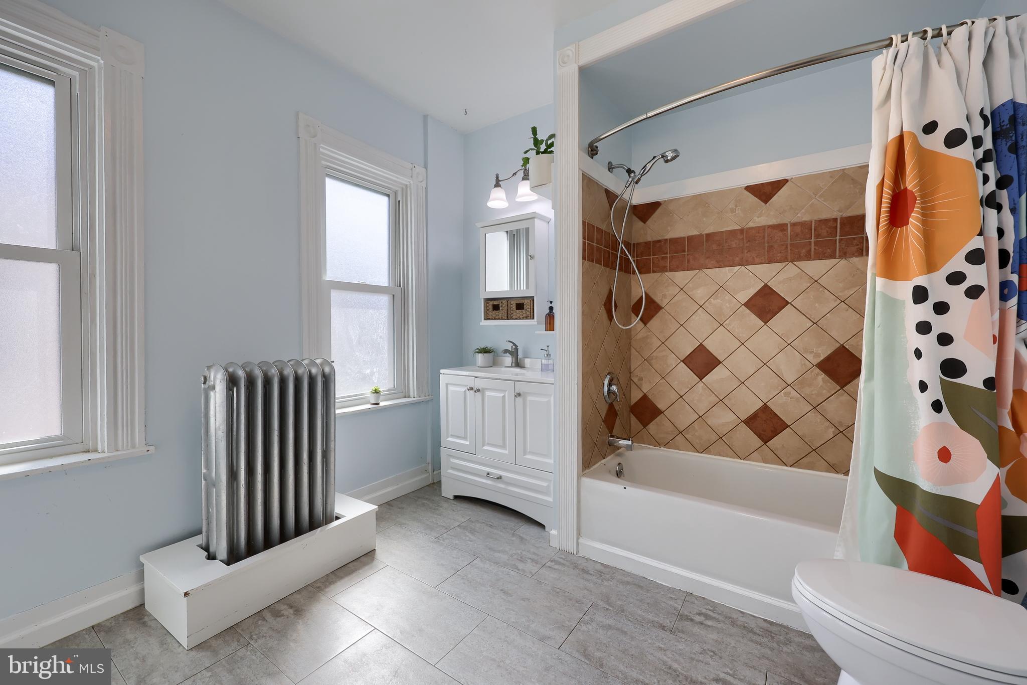 606 North Mary Street Lancaster, PA 17603 - Photo 22 of 33 a bathroom with a bathtub and a shower