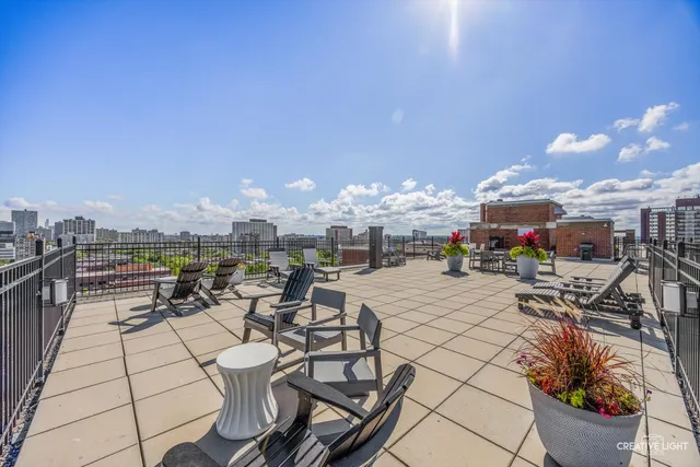 a view of a tables and chairs in patio