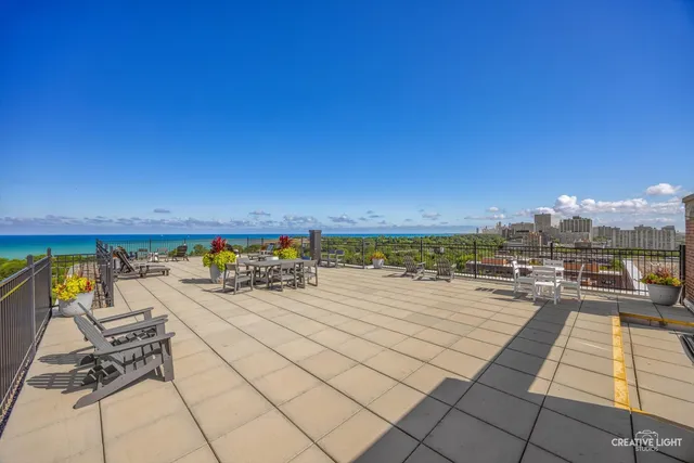a view of a terrace with furniture and a terrace view