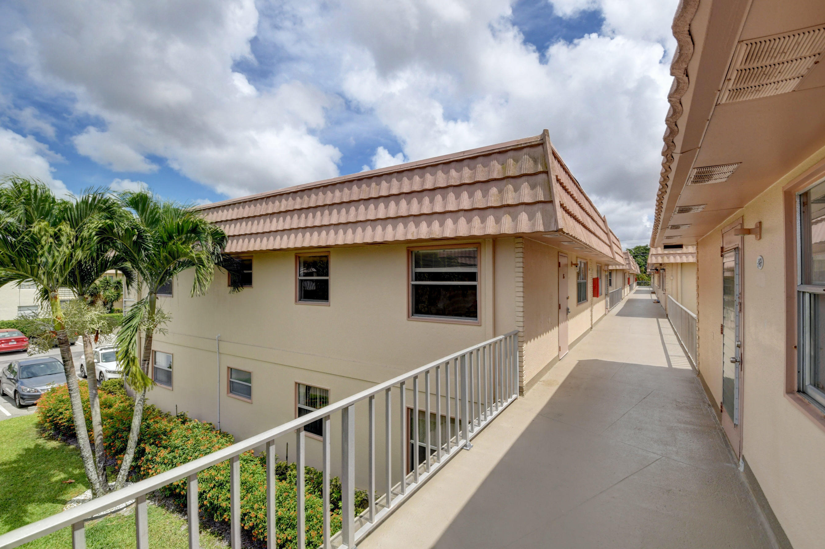 468 Saxony Way Delray Beach, FL 33446 - Photo 12 of 14 a view of a house with wooden fence
