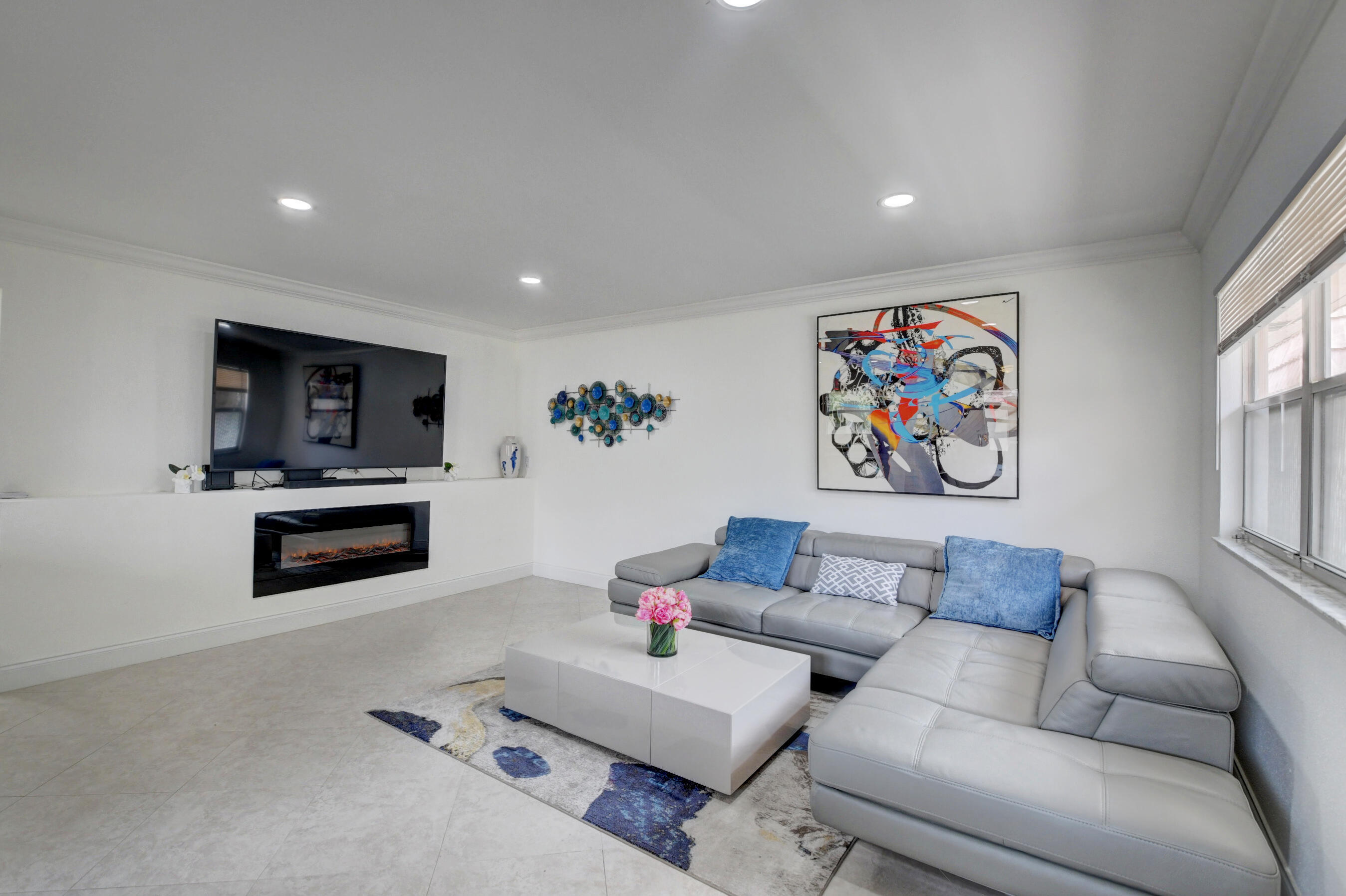 468 Saxony Way Delray Beach, FL 33446 - Photo 4 of 14 a living room with furniture and a flat screen tv