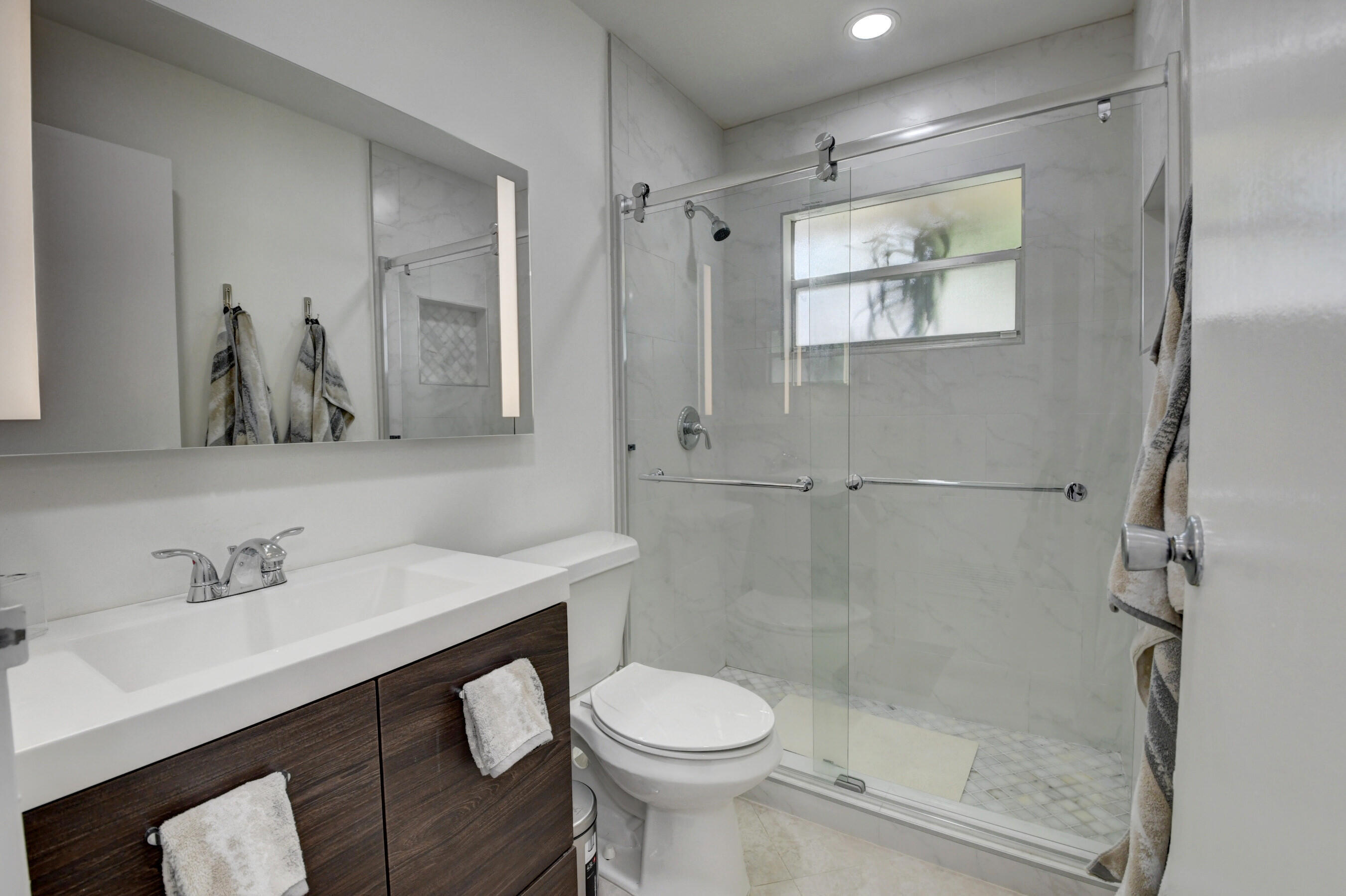 468 Saxony Way Delray Beach, FL 33446 - Photo 5 of 14 a bathroom with a sink toilet and shower