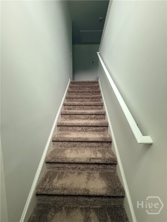 1244 Wilkins Road Midway, GA 31320 - Photo 28 of 58 Stairwell leading to floor 2