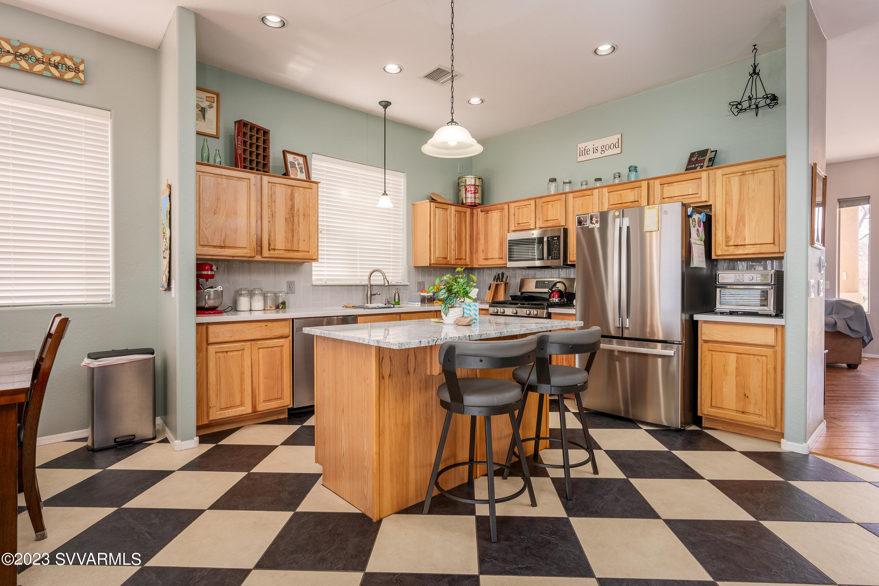 856 West Deep Gorge Road Camp Verde, AZ 86322 - Photo 15 of 31 a kitchen with a refrigerator a sink and a stove