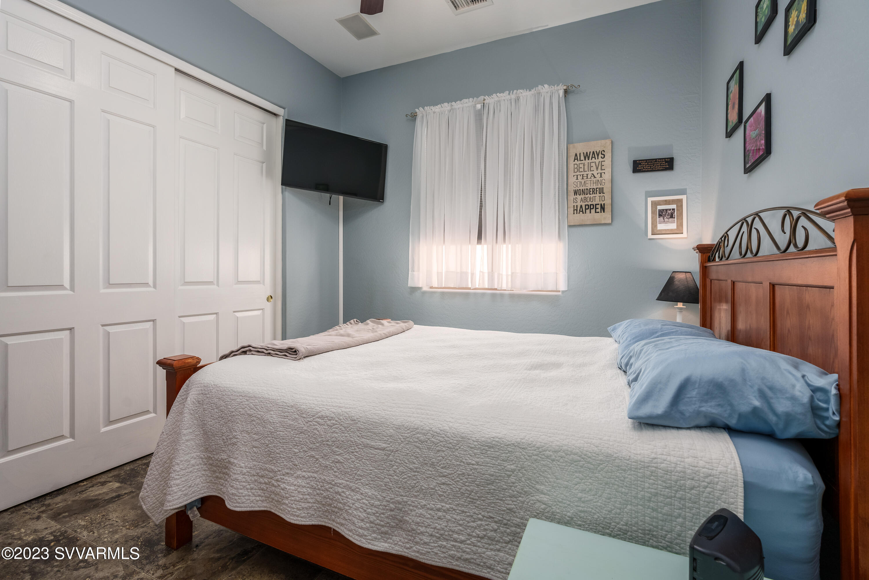 856 West Deep Gorge Road Camp Verde, AZ 86322 - Photo 22 of 31 a bedroom with a bed and a window
