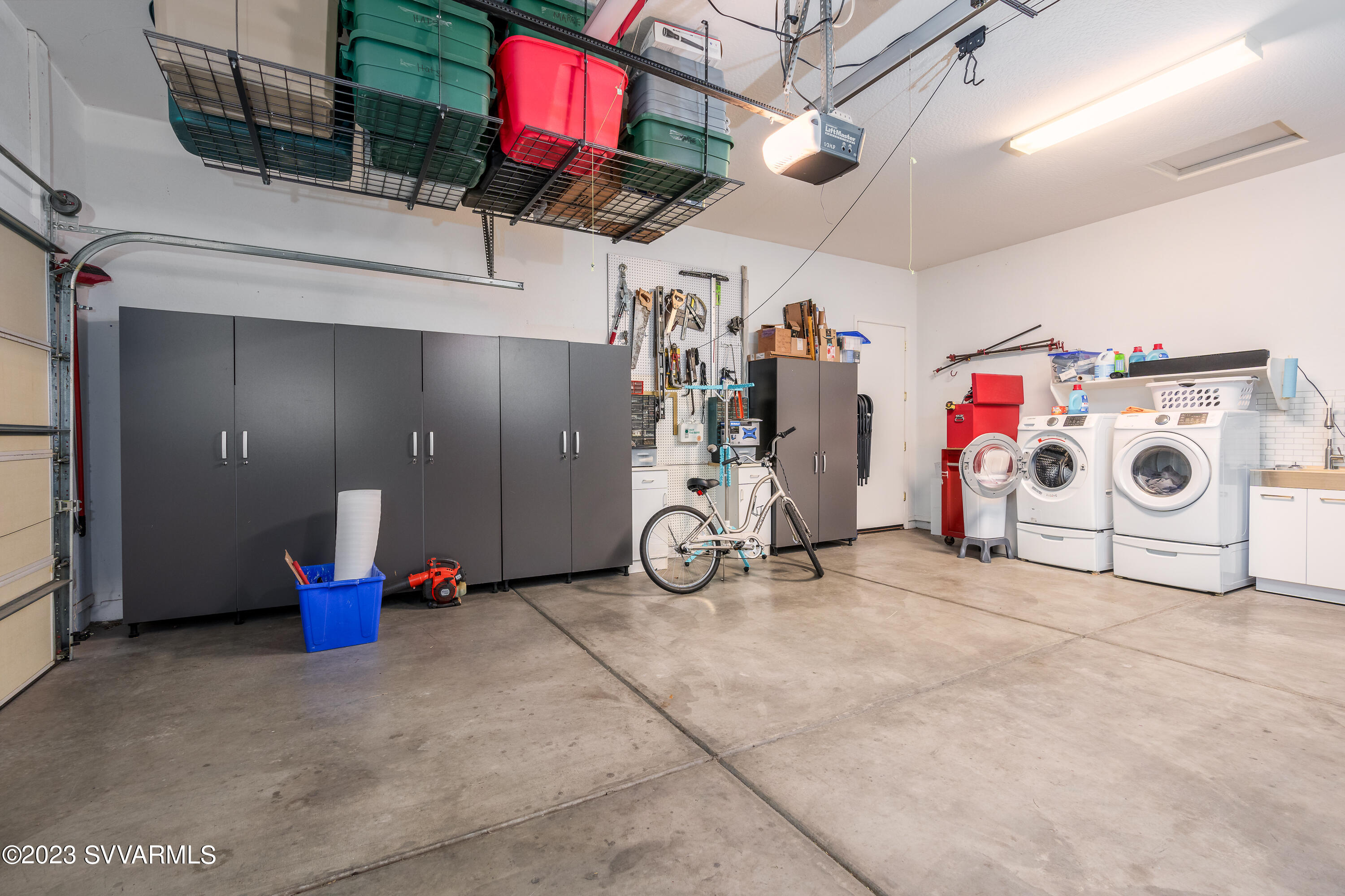 856 West Deep Gorge Road Camp Verde, AZ 86322 - Photo 25 of 31 a view of storage and utility room with a garage