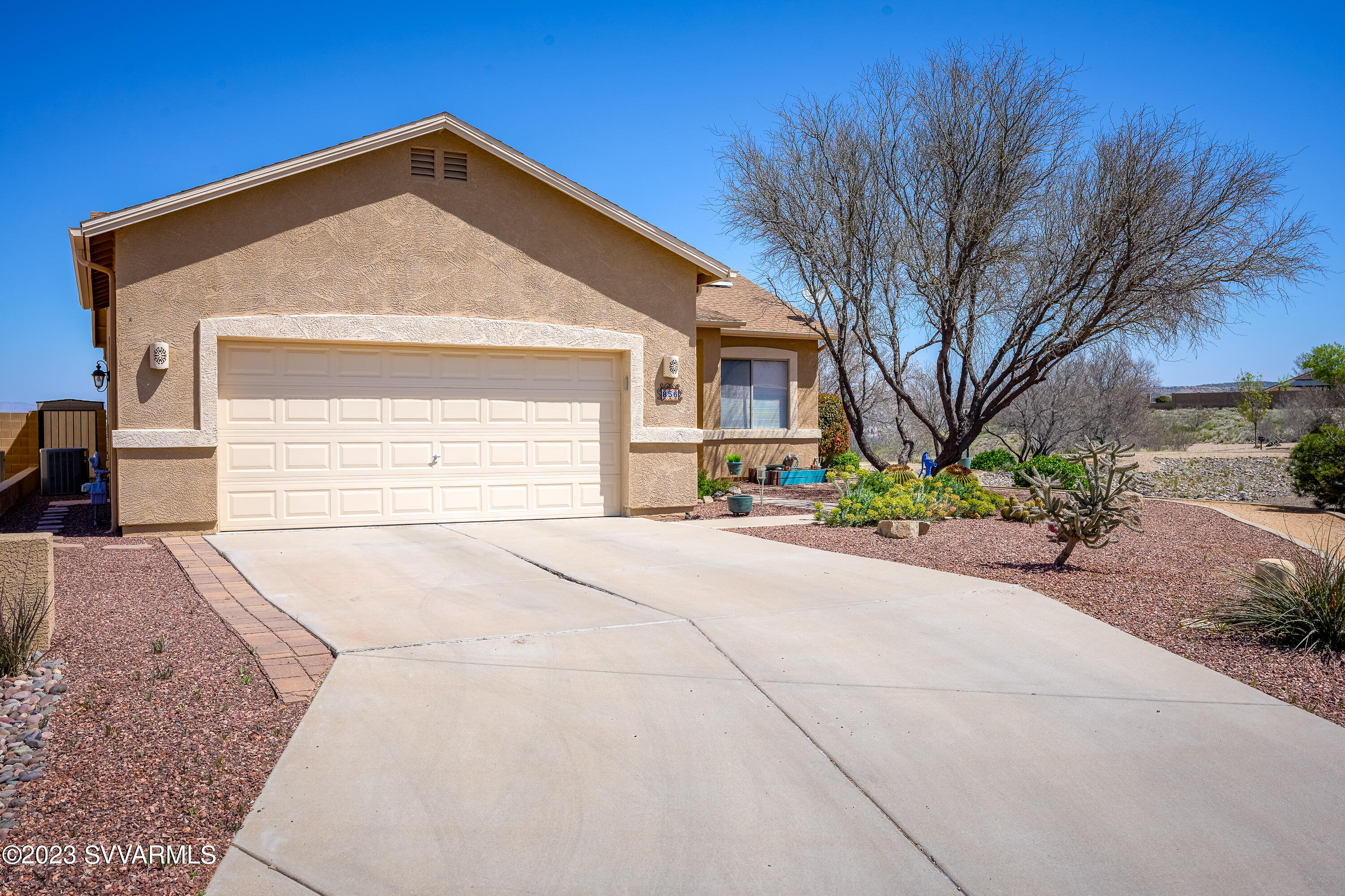 856 West Deep Gorge Road Camp Verde, AZ 86322 - Photo 3 of 31 a front view of a house with a yard and garage