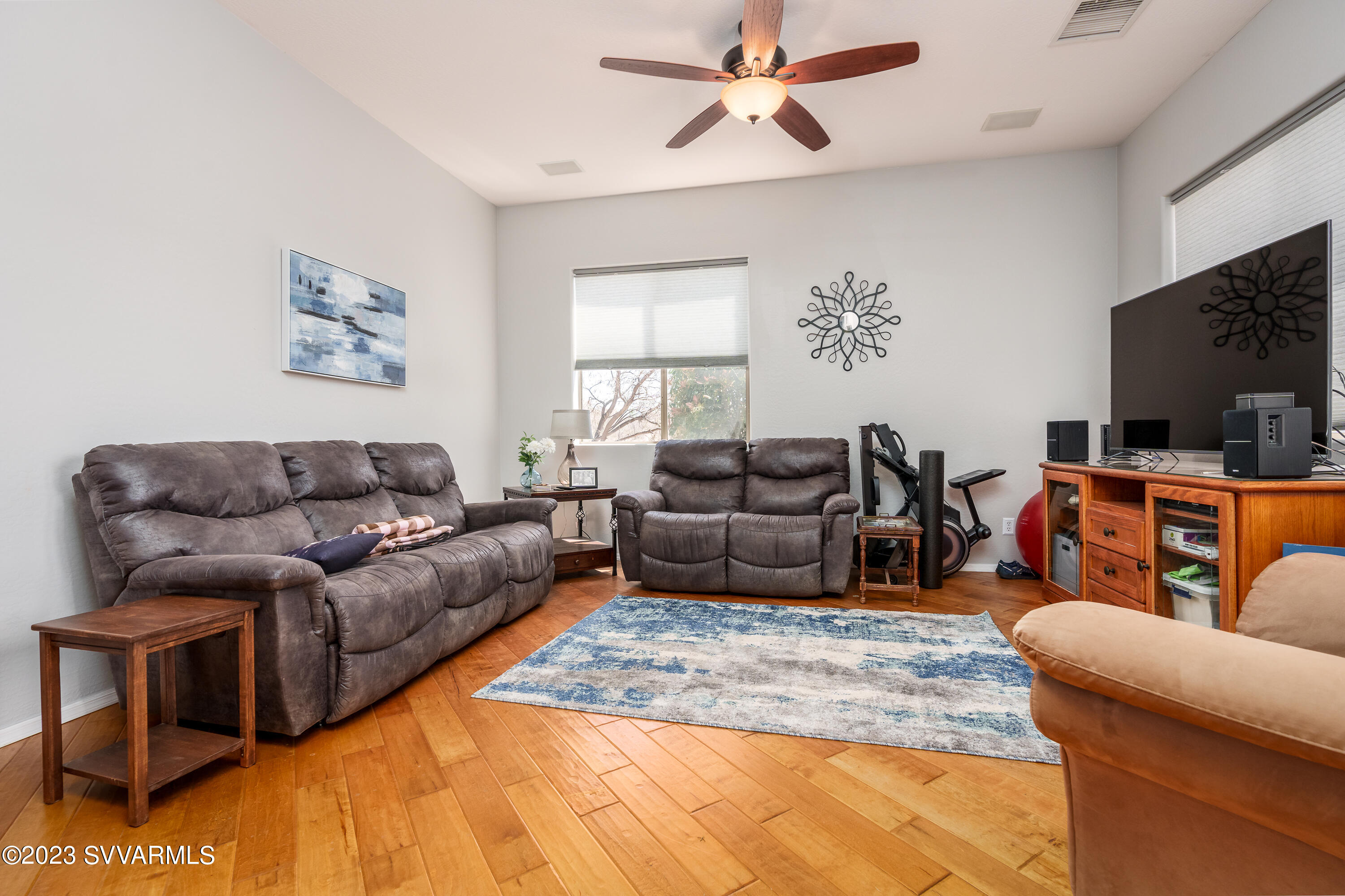 856 West Deep Gorge Road Camp Verde, AZ 86322 - Photo 10 of 31 a living room with furniture ceiling fan and a rug