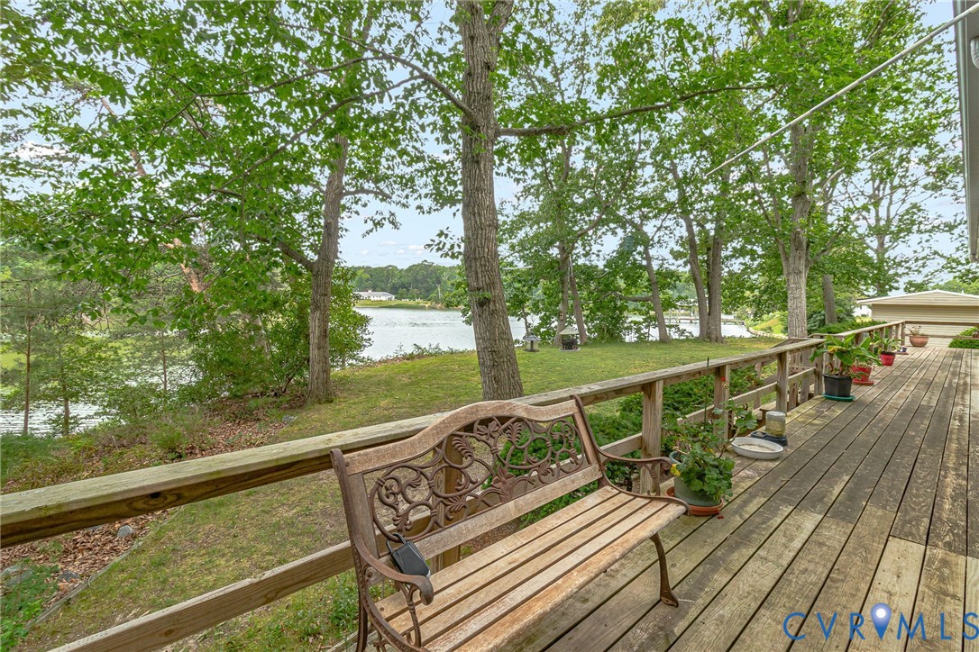 142 Bridge Lane Reedville, VA 22539 - Photo 51 of 56 a view of a balcony with wooden floor and fence