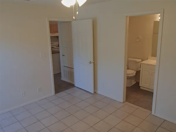 a bathroom view of a bathroom and a shower