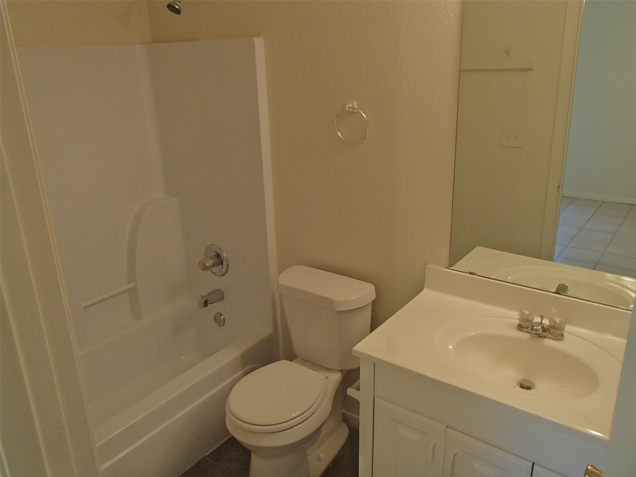 2202 Katy Lane, Unit A Georgetown, TX 78626 - Photo 8 of 9 Full bath with vanity, bathing tub / shower combination, and tile patterned flooring