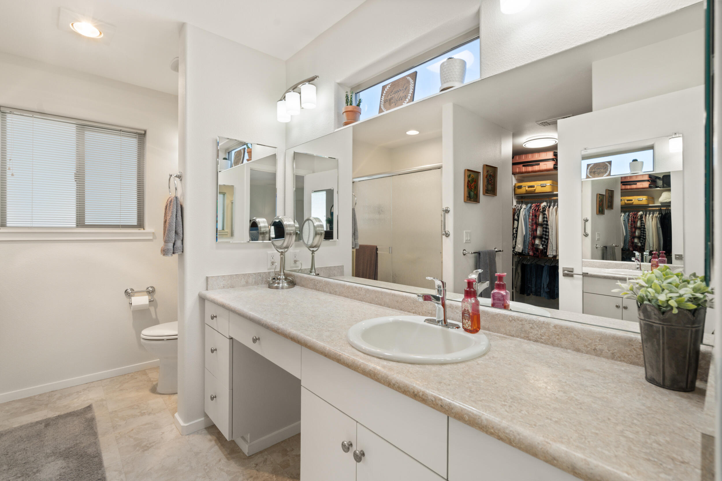 1008 Azure Way Eagle Point, OR 97524 - Photo 24 of 59 a bathroom with a sink double vanity and a mirror