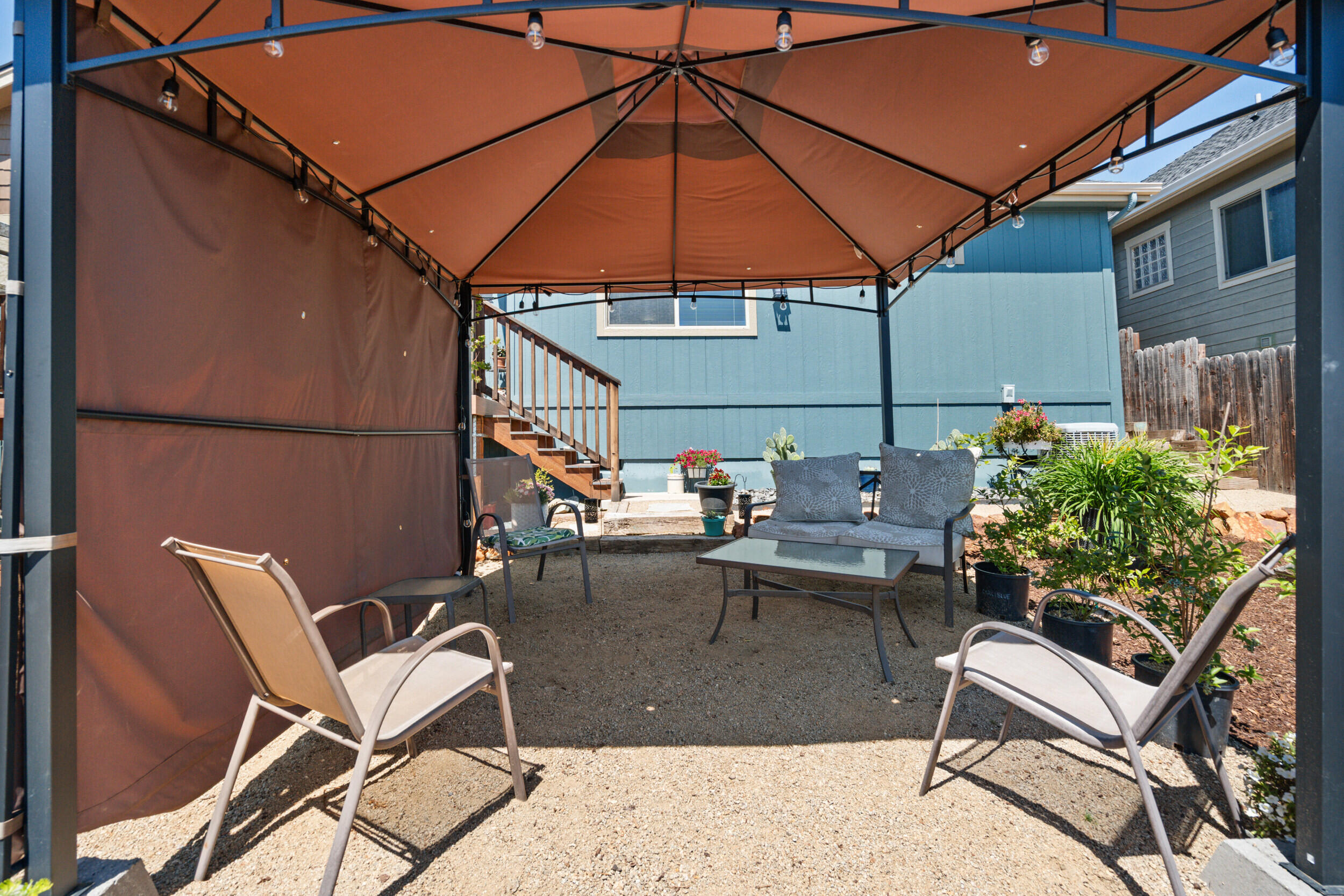 1008 Azure Way Eagle Point, OR 97524 - Photo 39 of 59 a backyard of a house with table and chairs