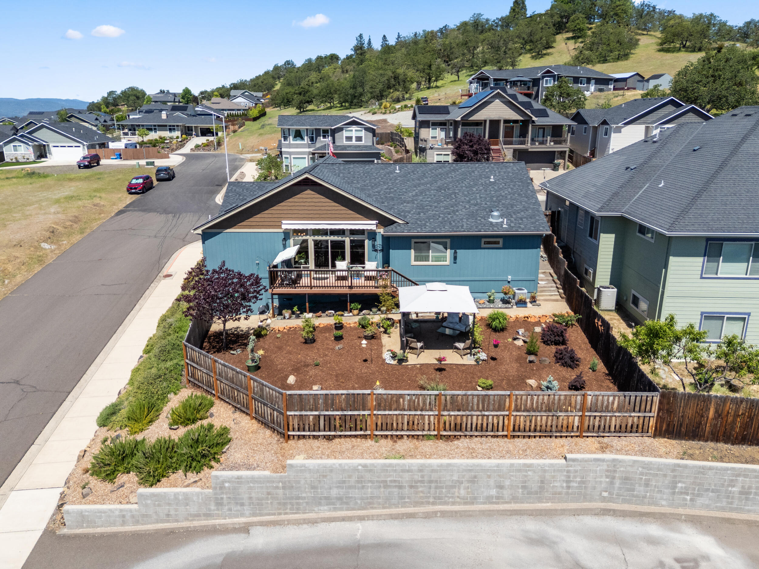 1008 Azure Way Eagle Point, OR 97524 - Photo 43 of 59 an aerial view of a house with a yard