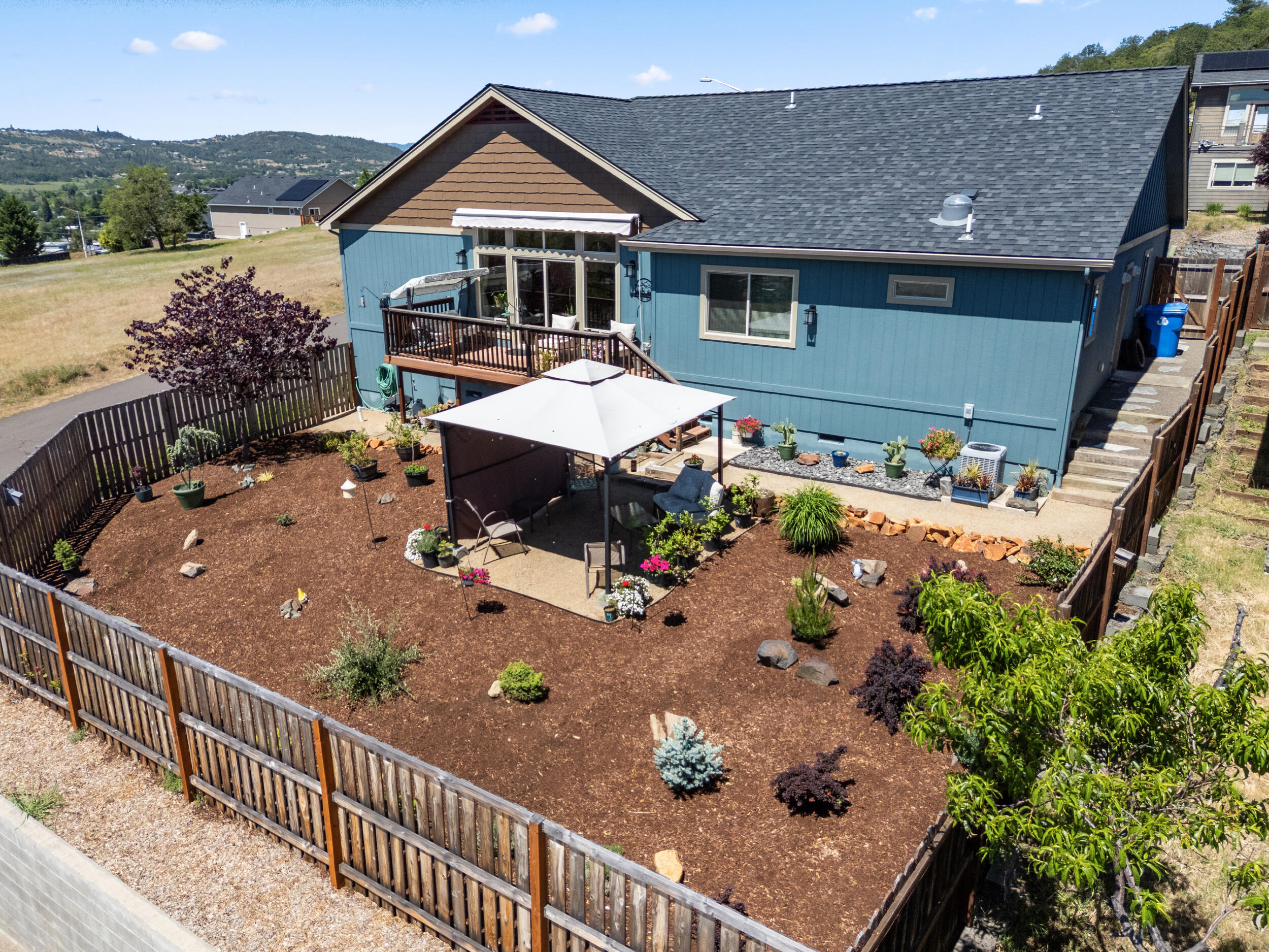 1008 Azure Way Eagle Point, OR 97524 - Photo 45 of 59 a view of a house with a yard